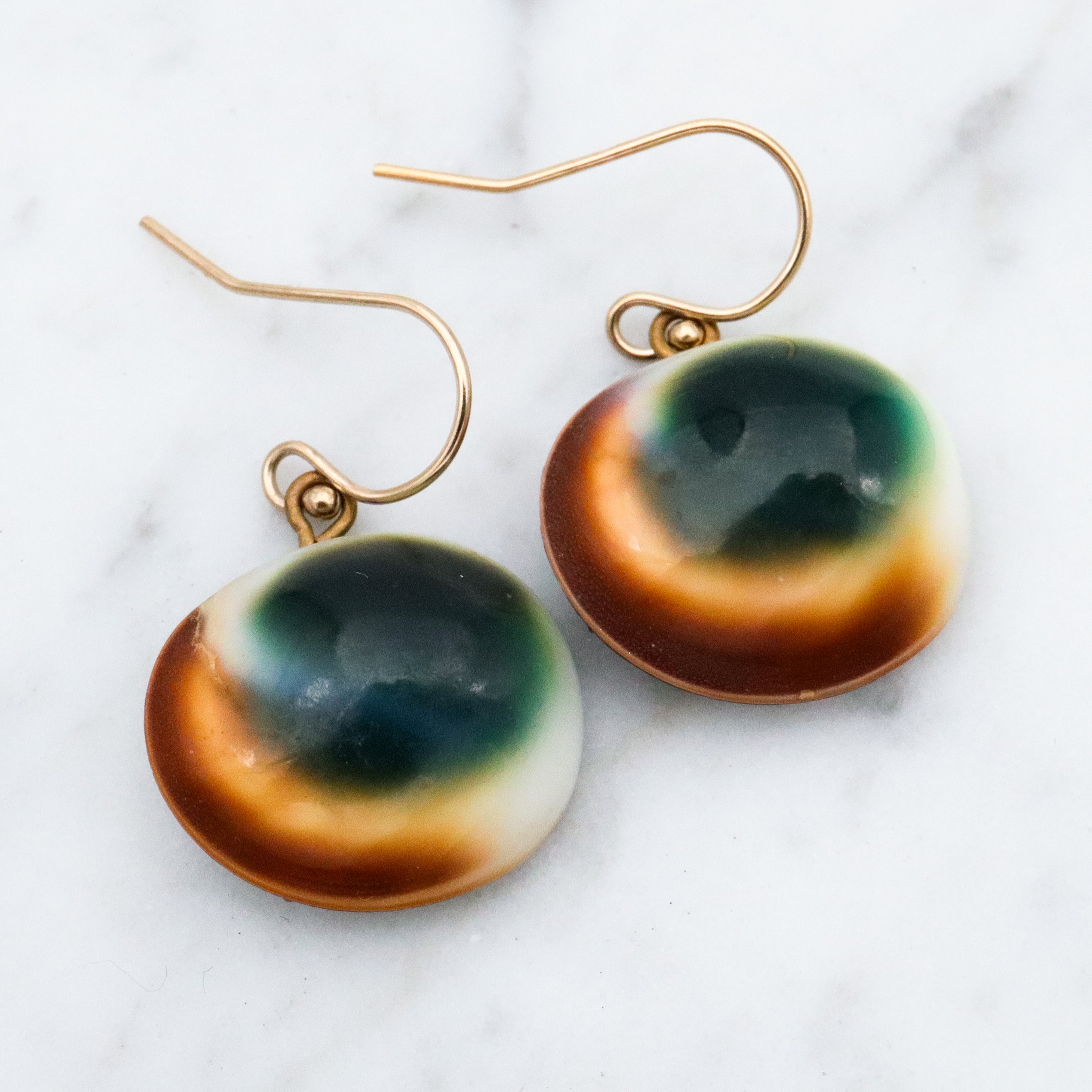 Mid Century cat's eye operculum shell drop earrings