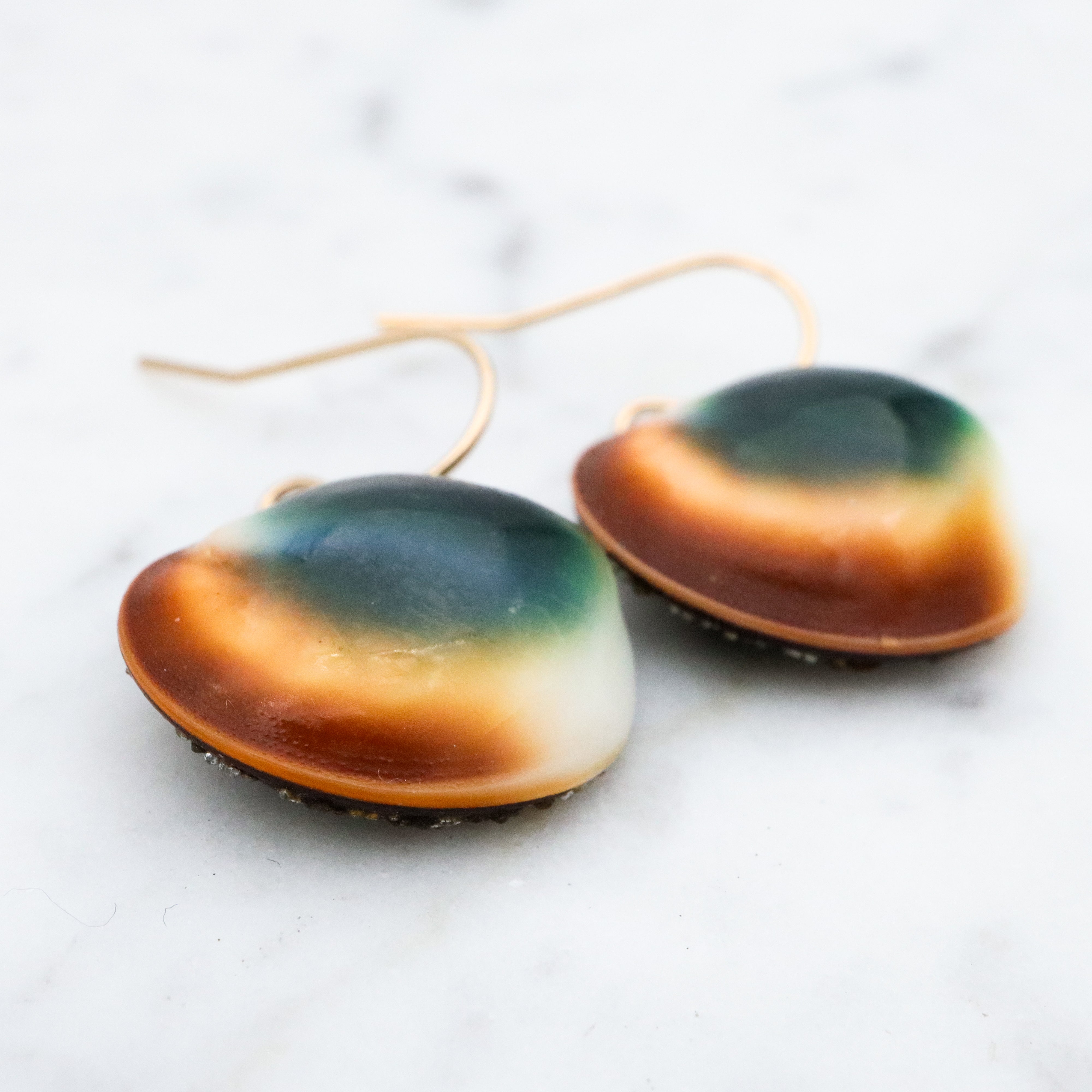 Mid Century cat's eye operculum shell drop earrings