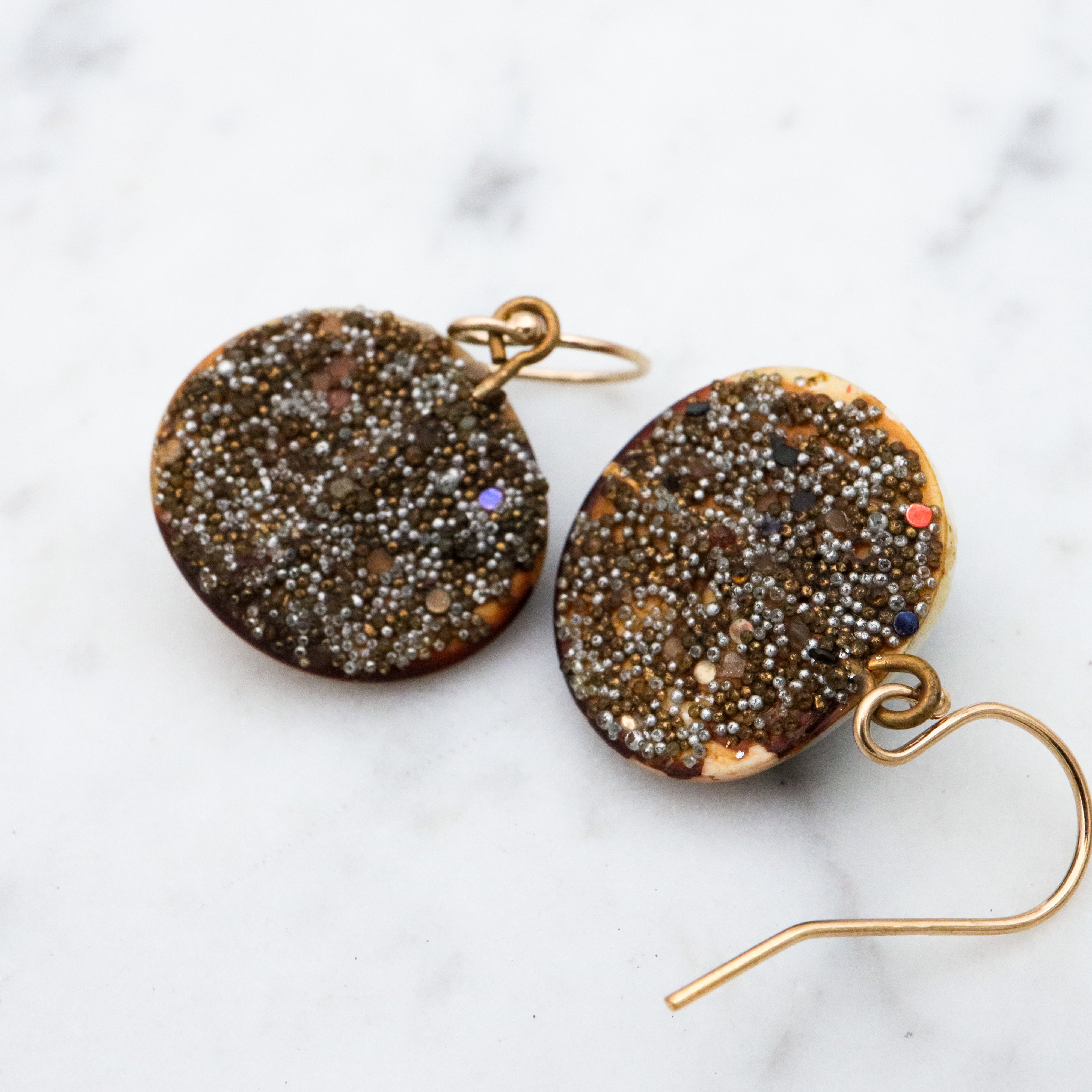 Mid Century cat's eye operculum shell drop earrings