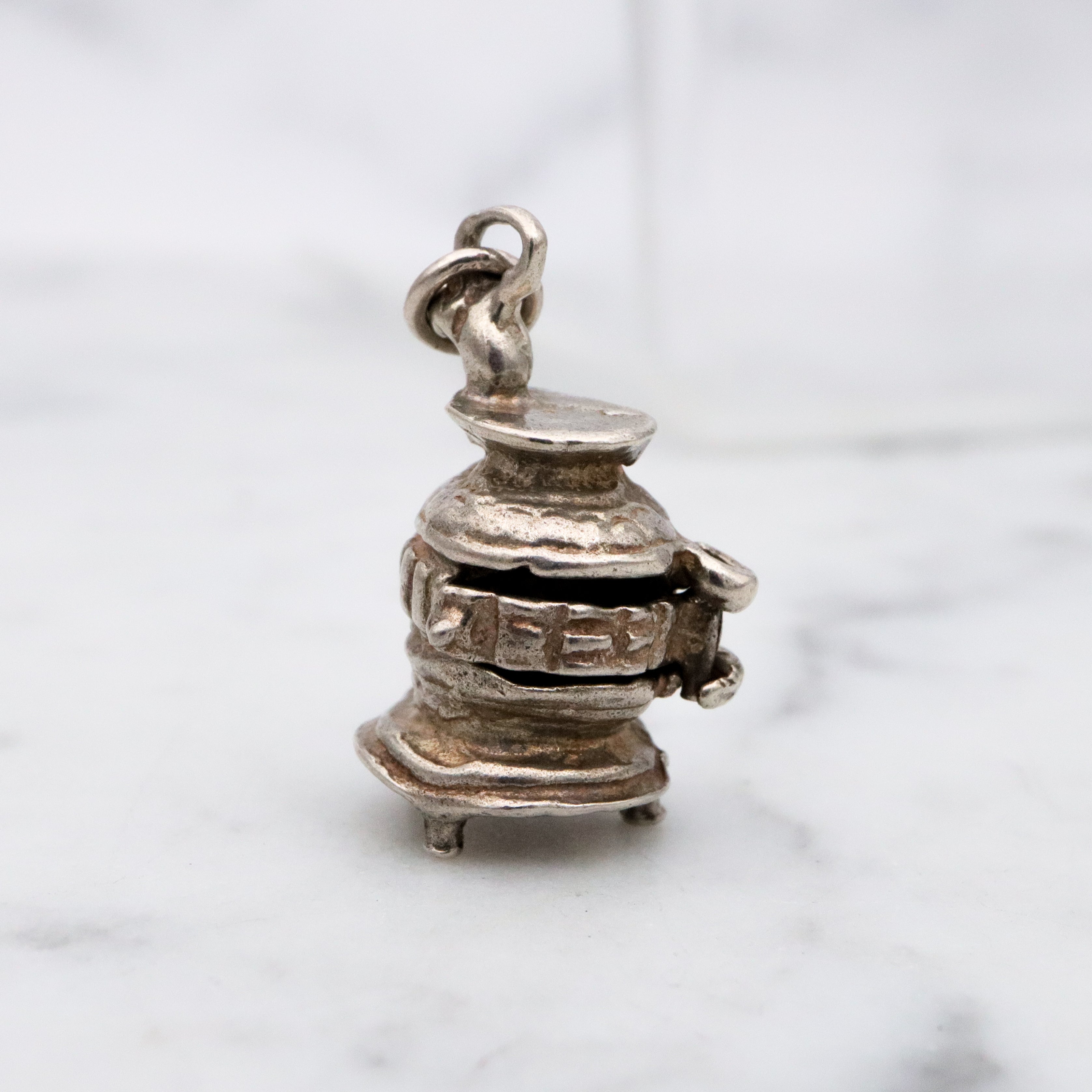 Vintage sterling opening wood stove charm pendant