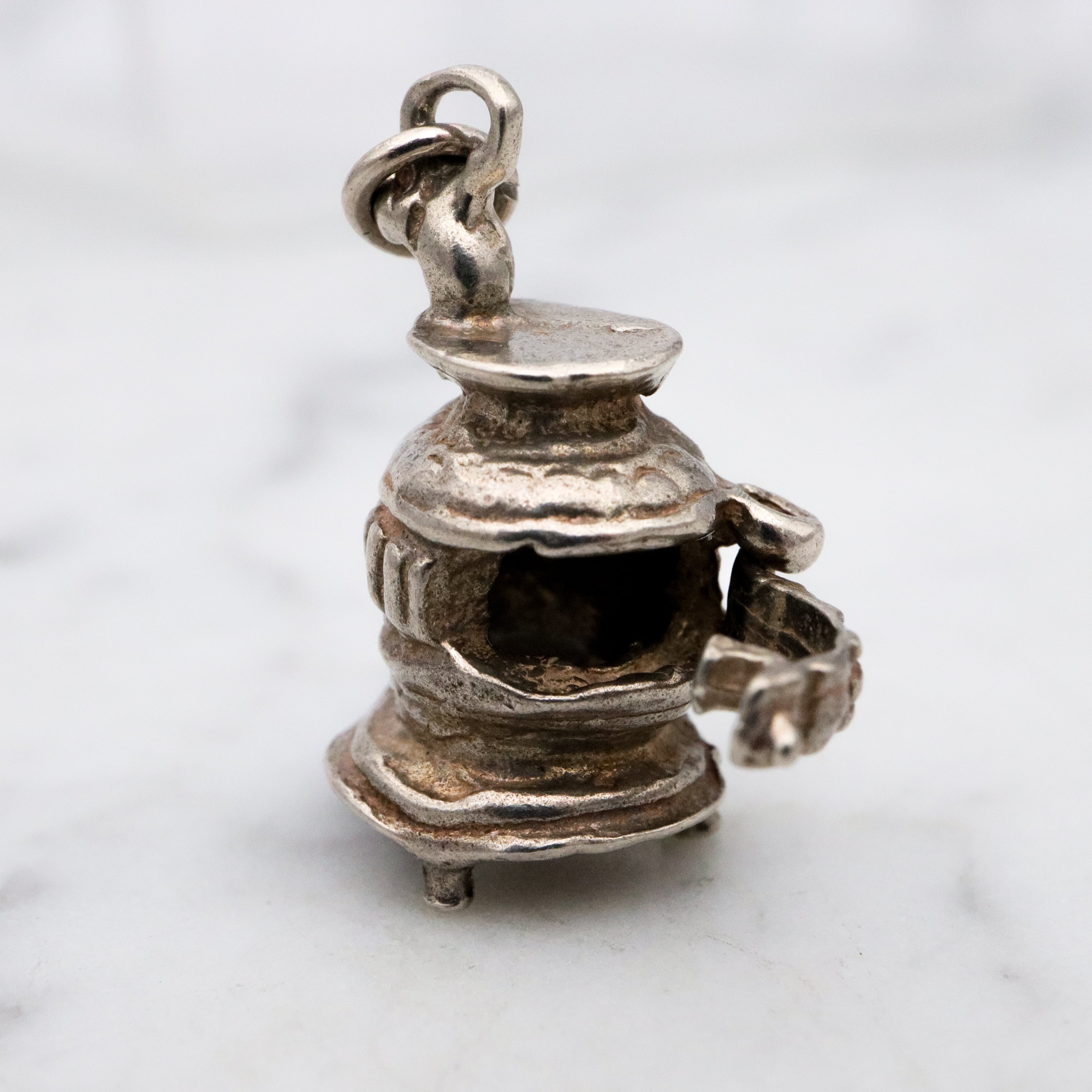 Vintage sterling opening wood stove charm pendant