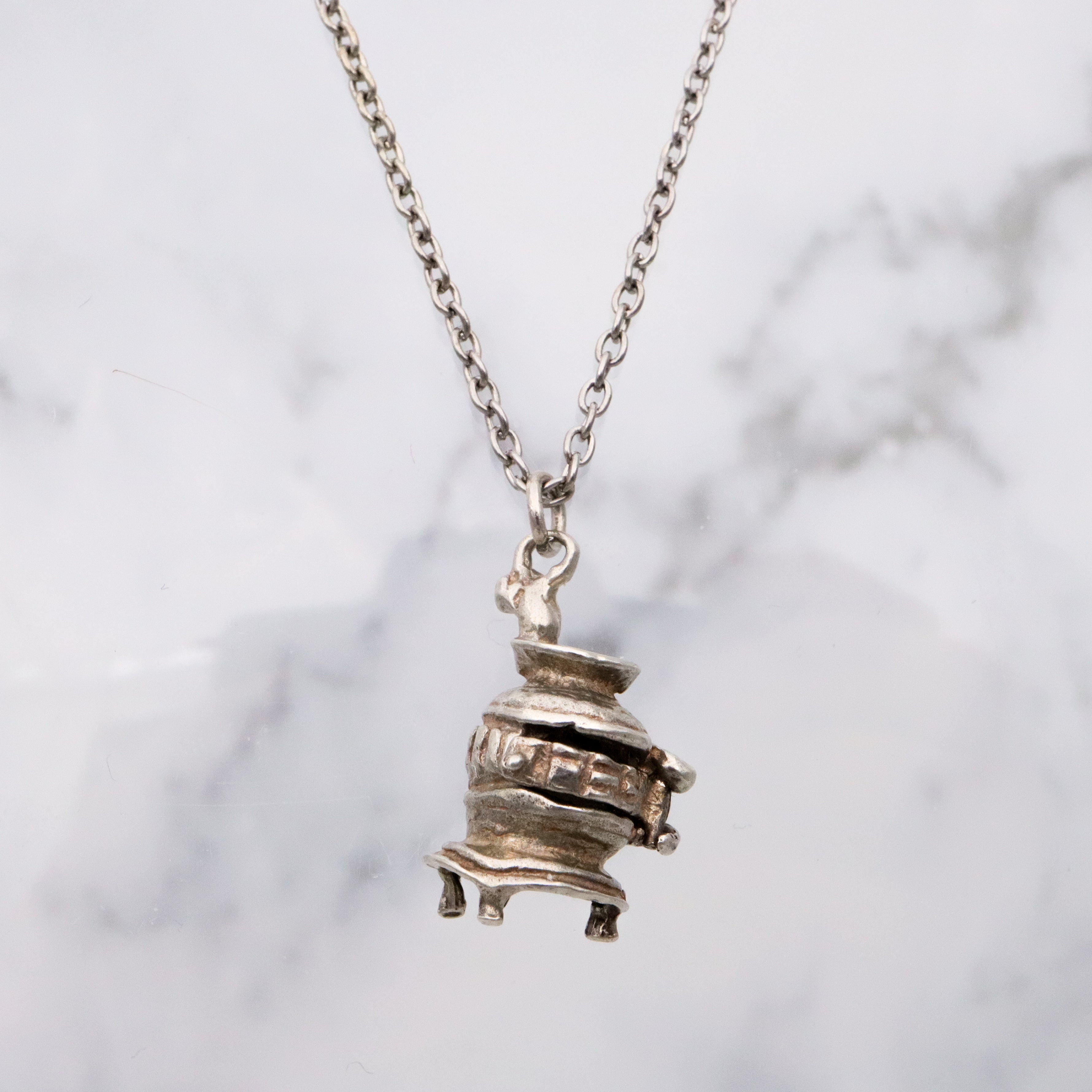 Vintage sterling opening wood stove charm pendant