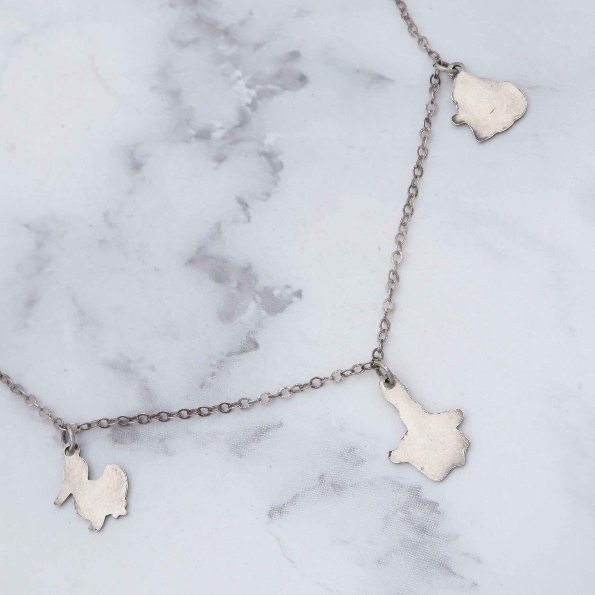 Antique sterling child’s nursery rhyme necklace