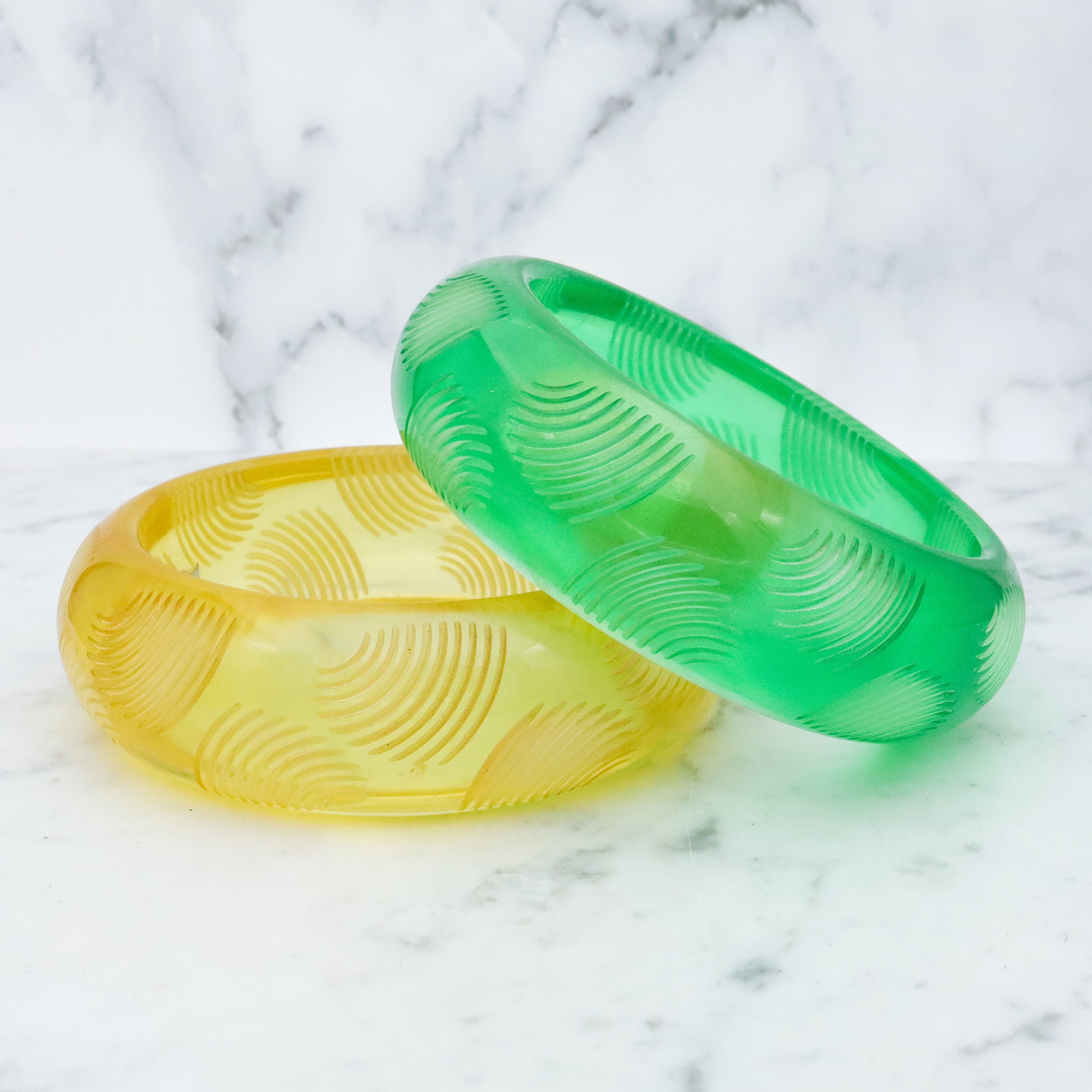 Pair of Bill Schiffer Mid Century carved lucite chunky bangle bracelets