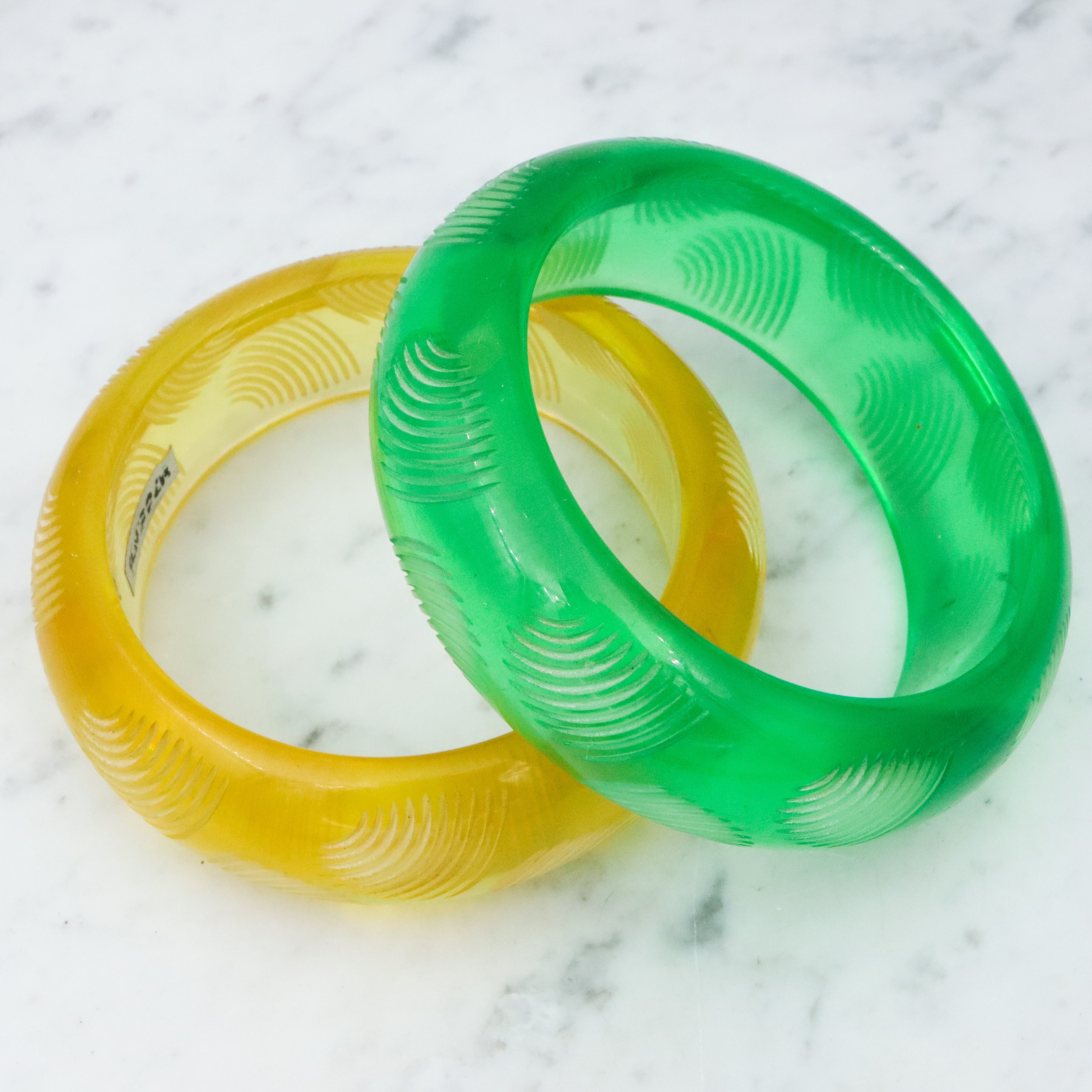 Pair of Bill Schiffer Mid Century carved lucite chunky bangle bracelets