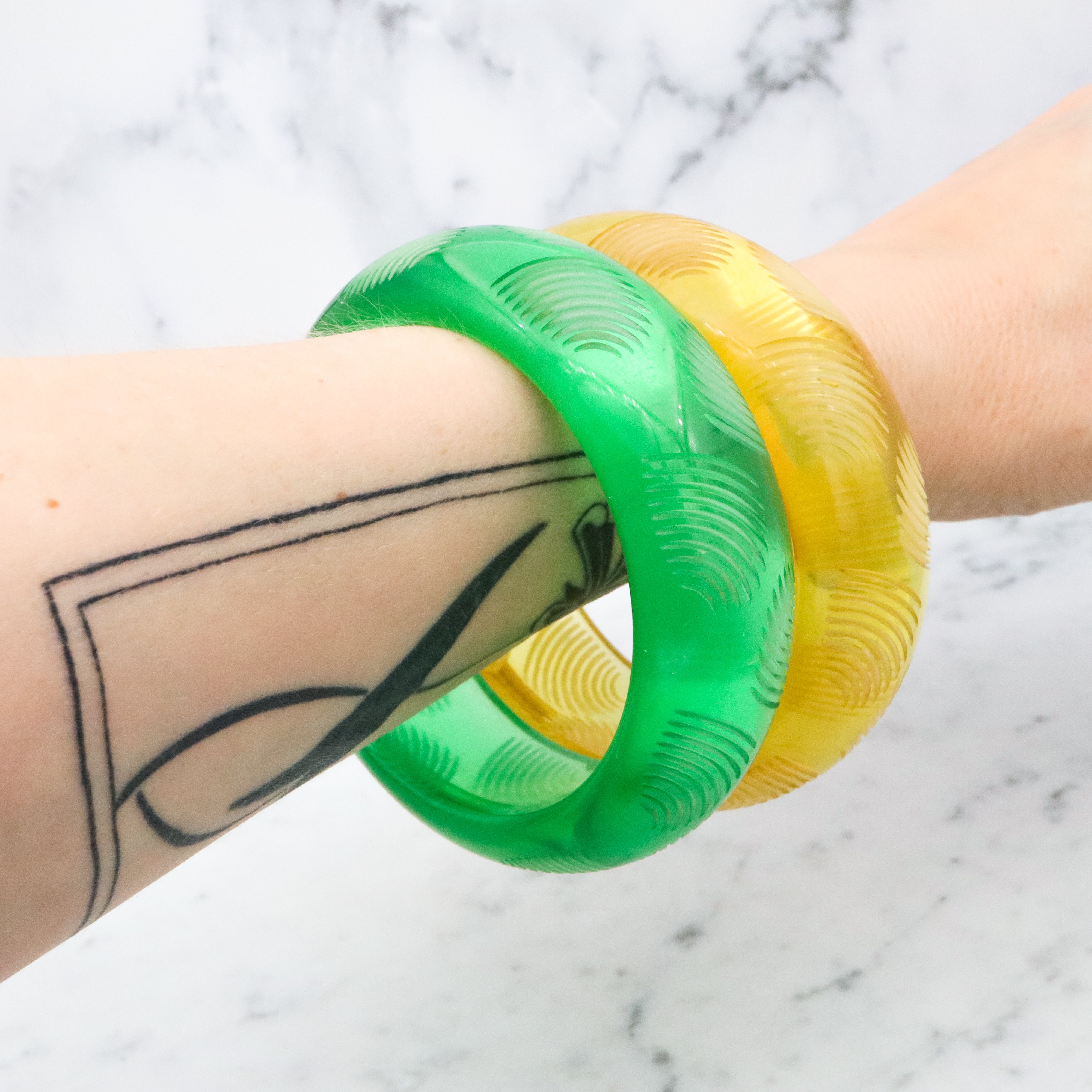 Pair of Bill Schiffer Mid Century carved lucite chunky bangle bracelets