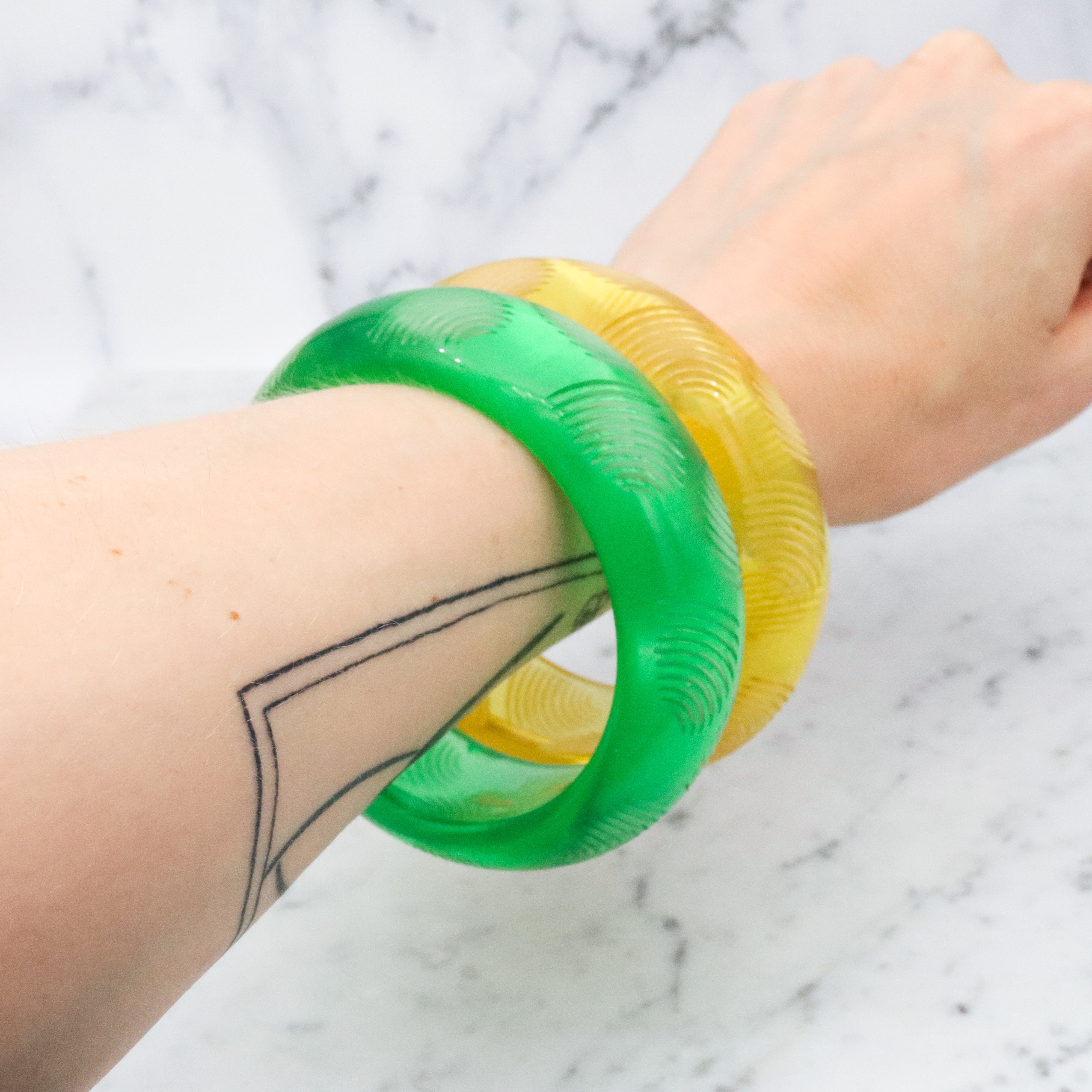 Pair of Bill Schiffer Mid Century carved lucite chunky bangle bracelets