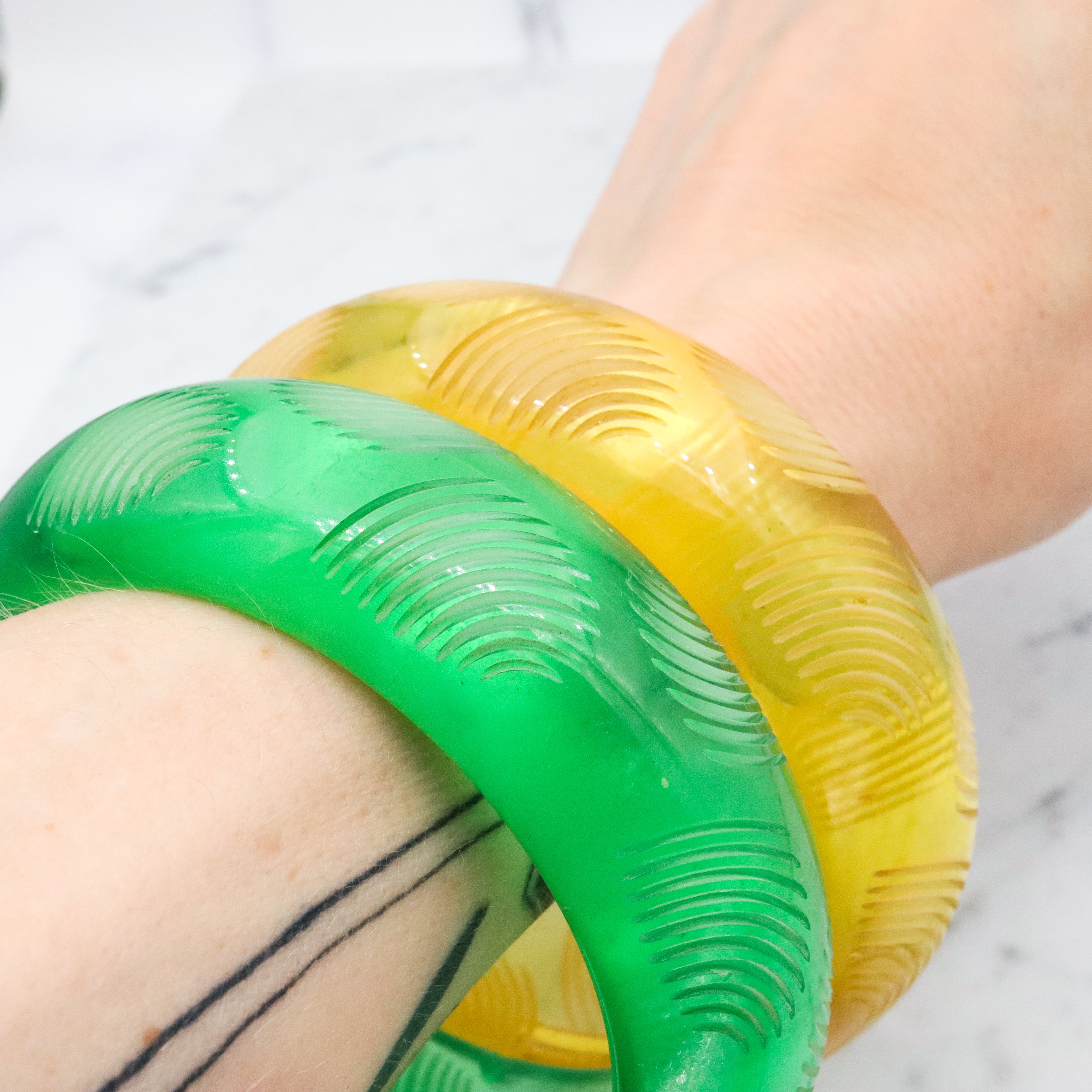 Pair of Bill Schiffer Mid Century carved lucite chunky bangle bracelets