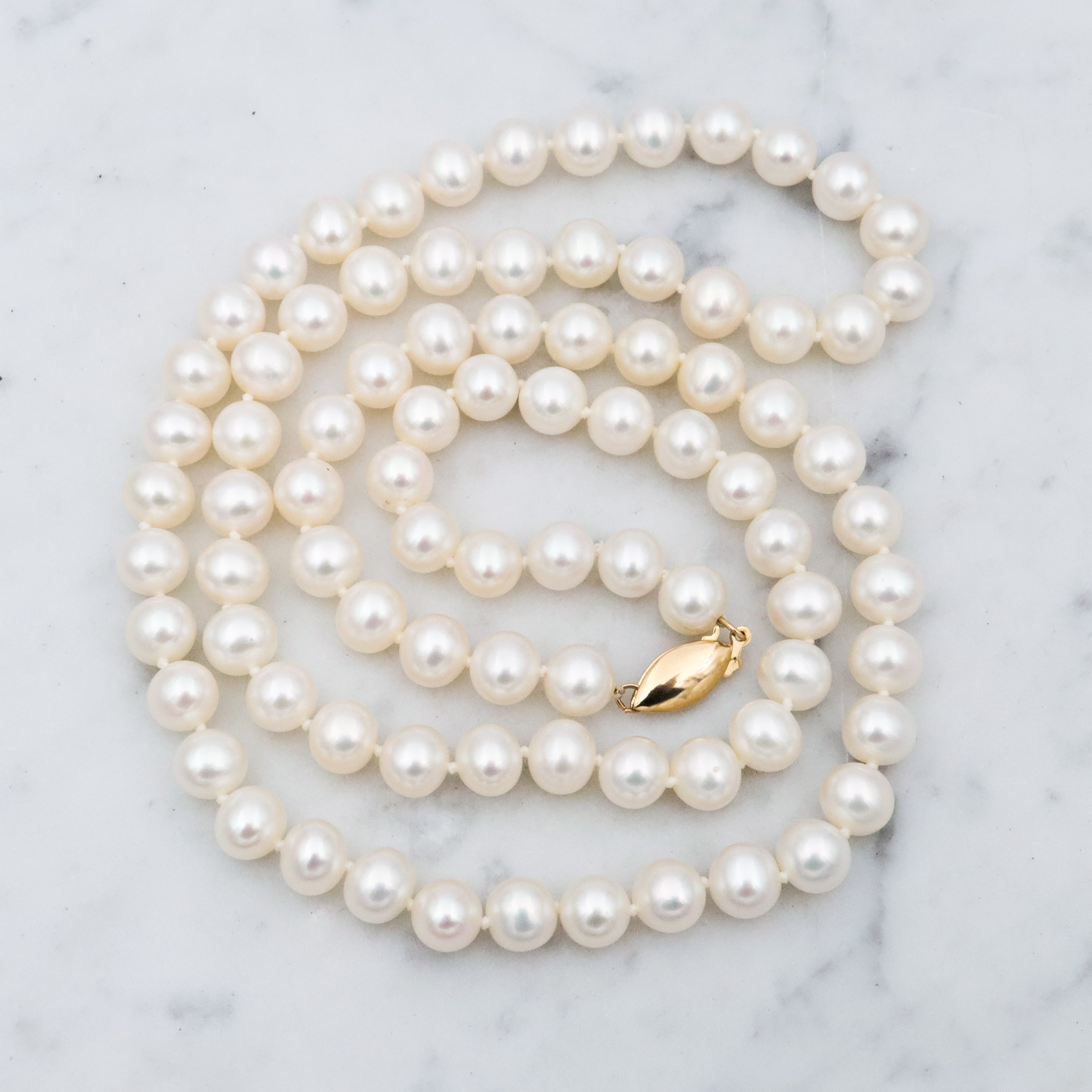 Vintage Mid Century Honora 7mm cultured pearl strand necklace with 14k gold clasp