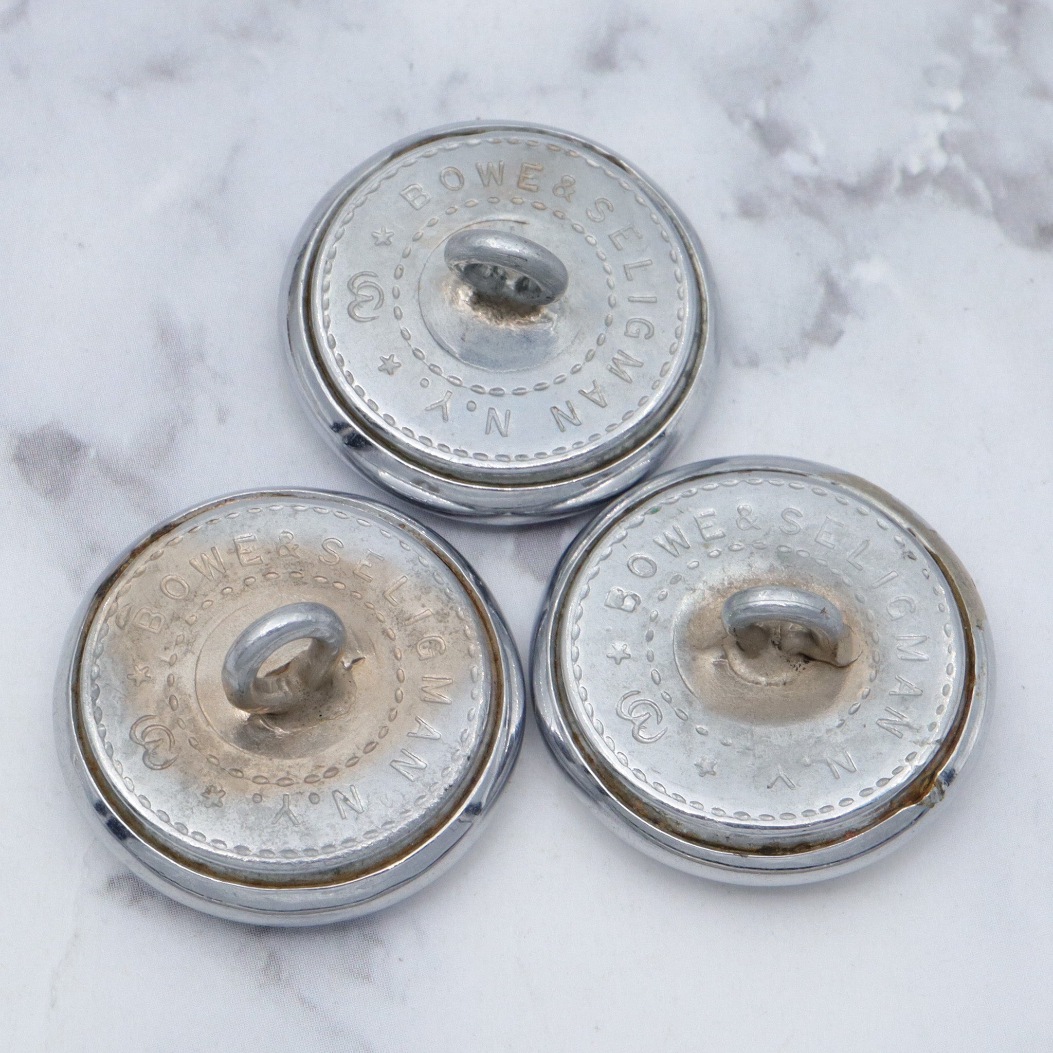 Large group of 28 Antique silver-plated brass livery buttons with rampant lion