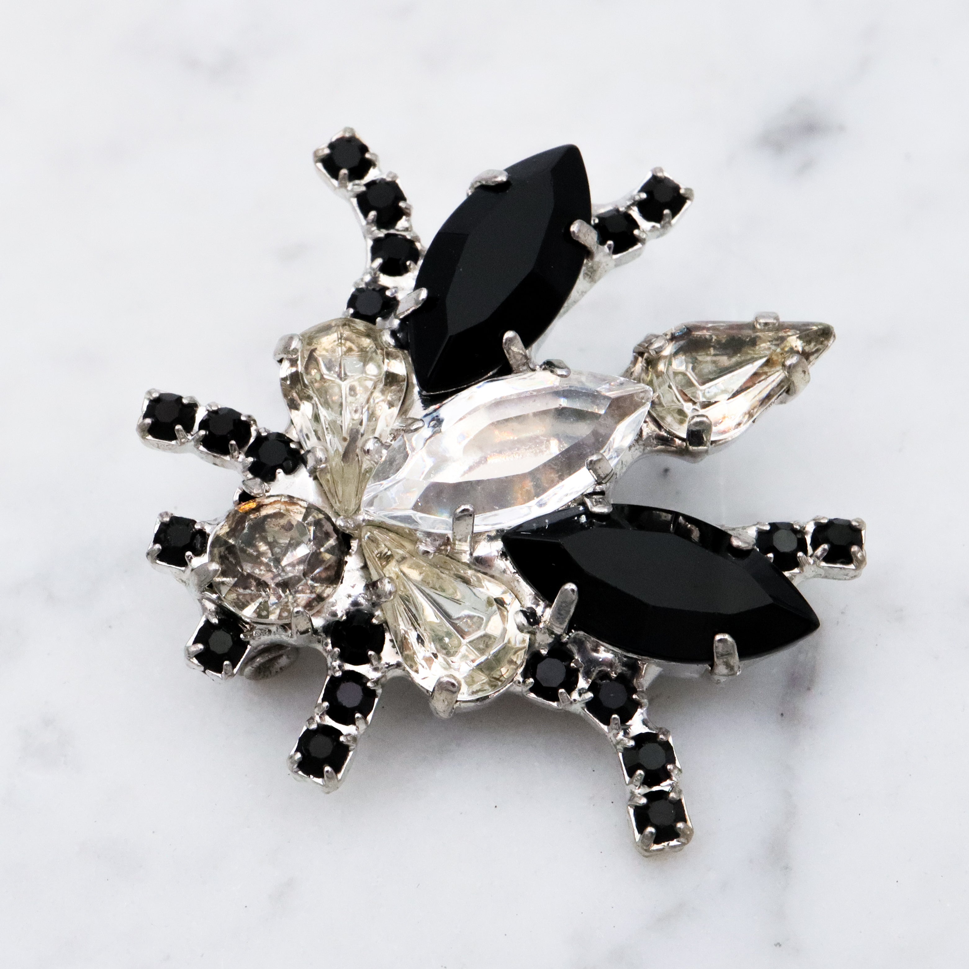 Vintage black & clear rhinestone bug brooch