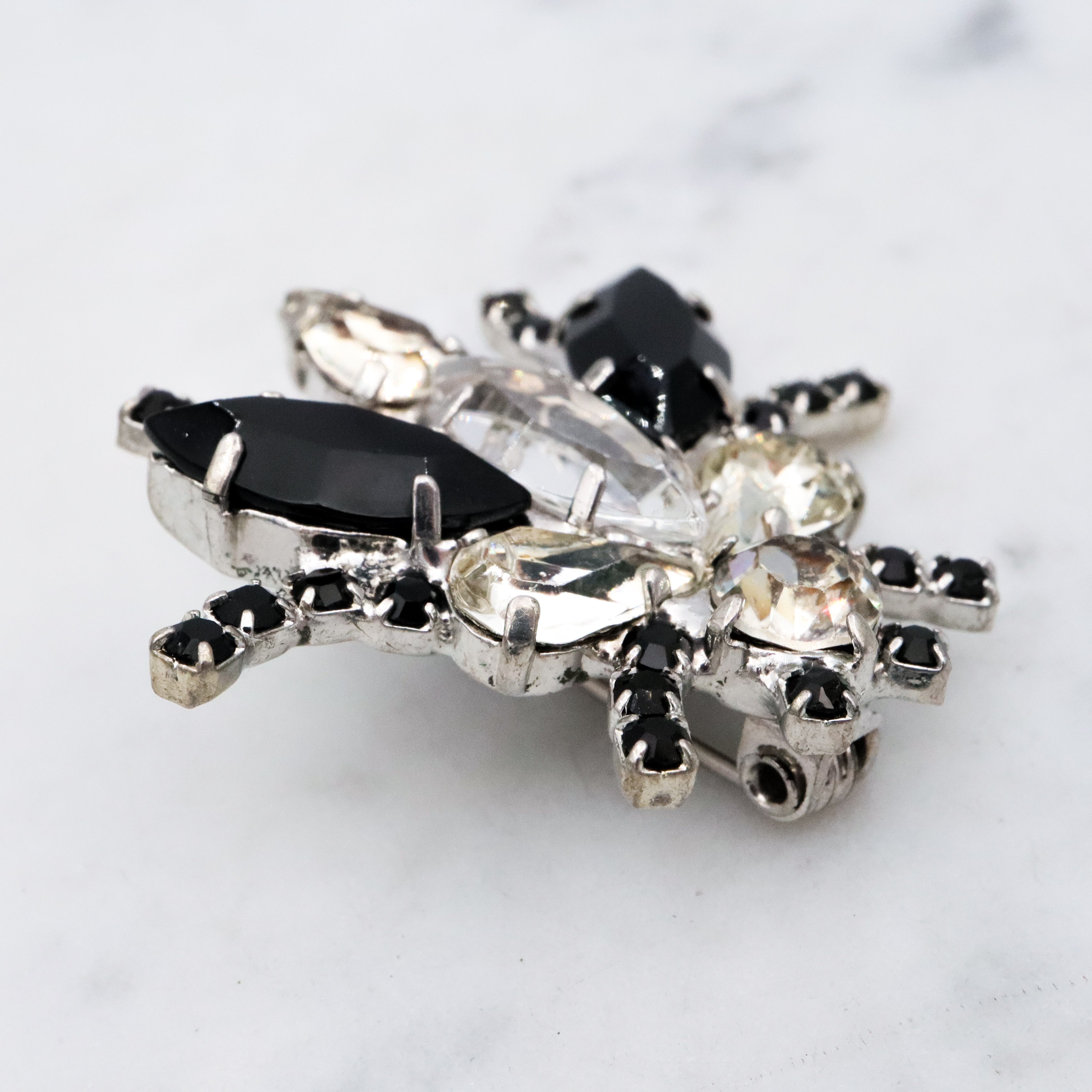 Vintage black & clear rhinestone bug brooch