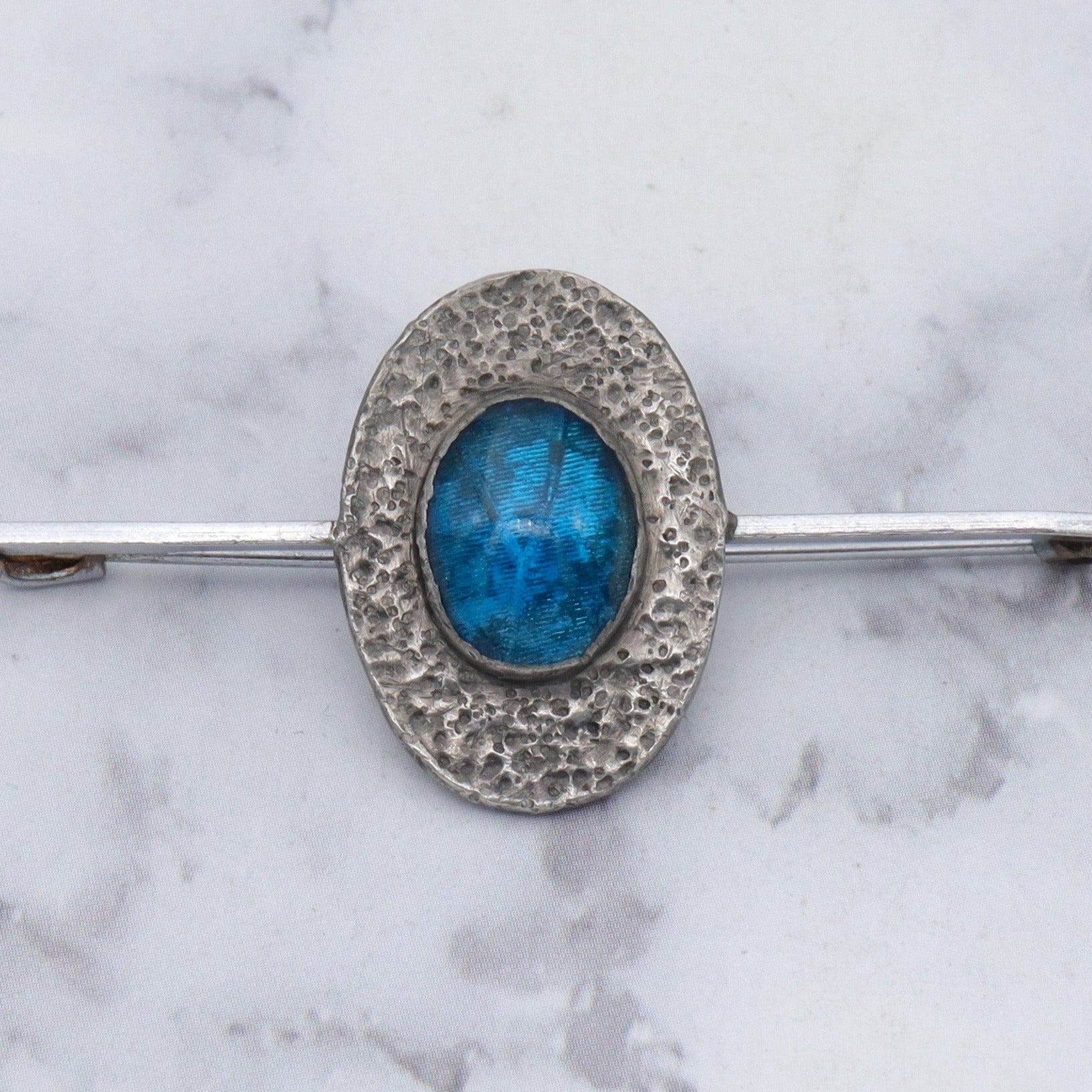 Antique Arts & Crafts hammered pewter morpho wing brooch