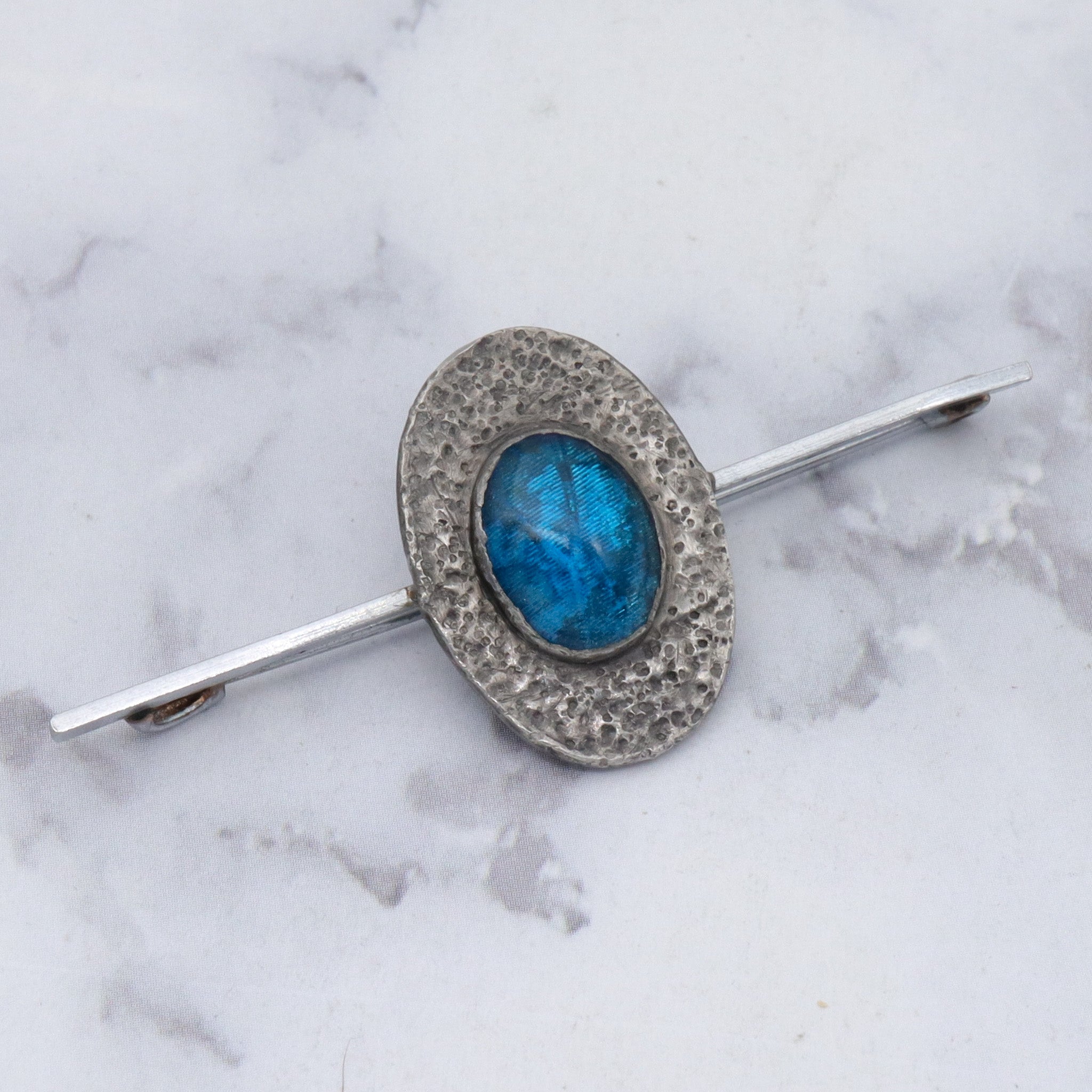 Antique Arts & Crafts hammered pewter morpho wing brooch