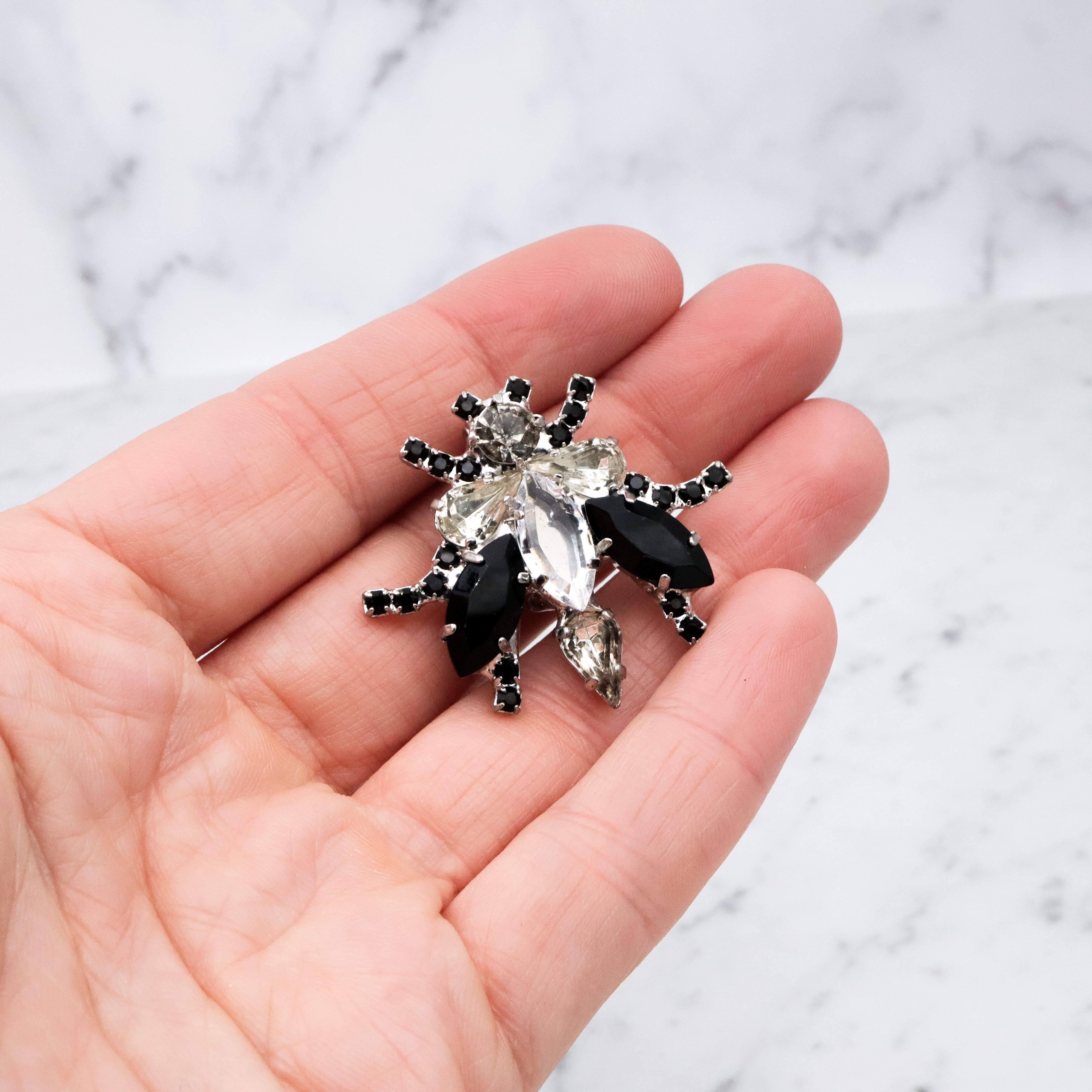 Vintage black & clear rhinestone bug brooch