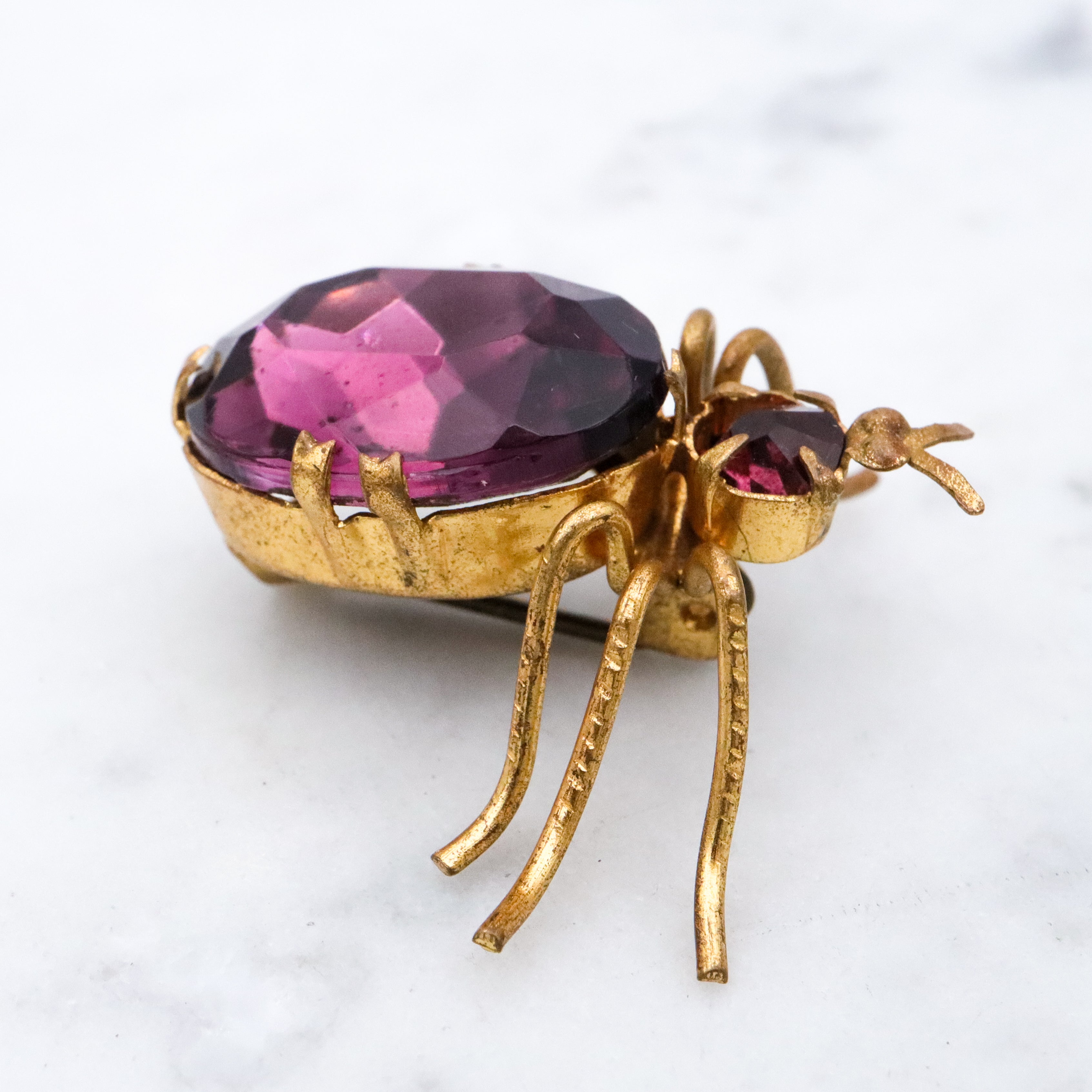 Antique purple rhinestone gilt metal bug brooch