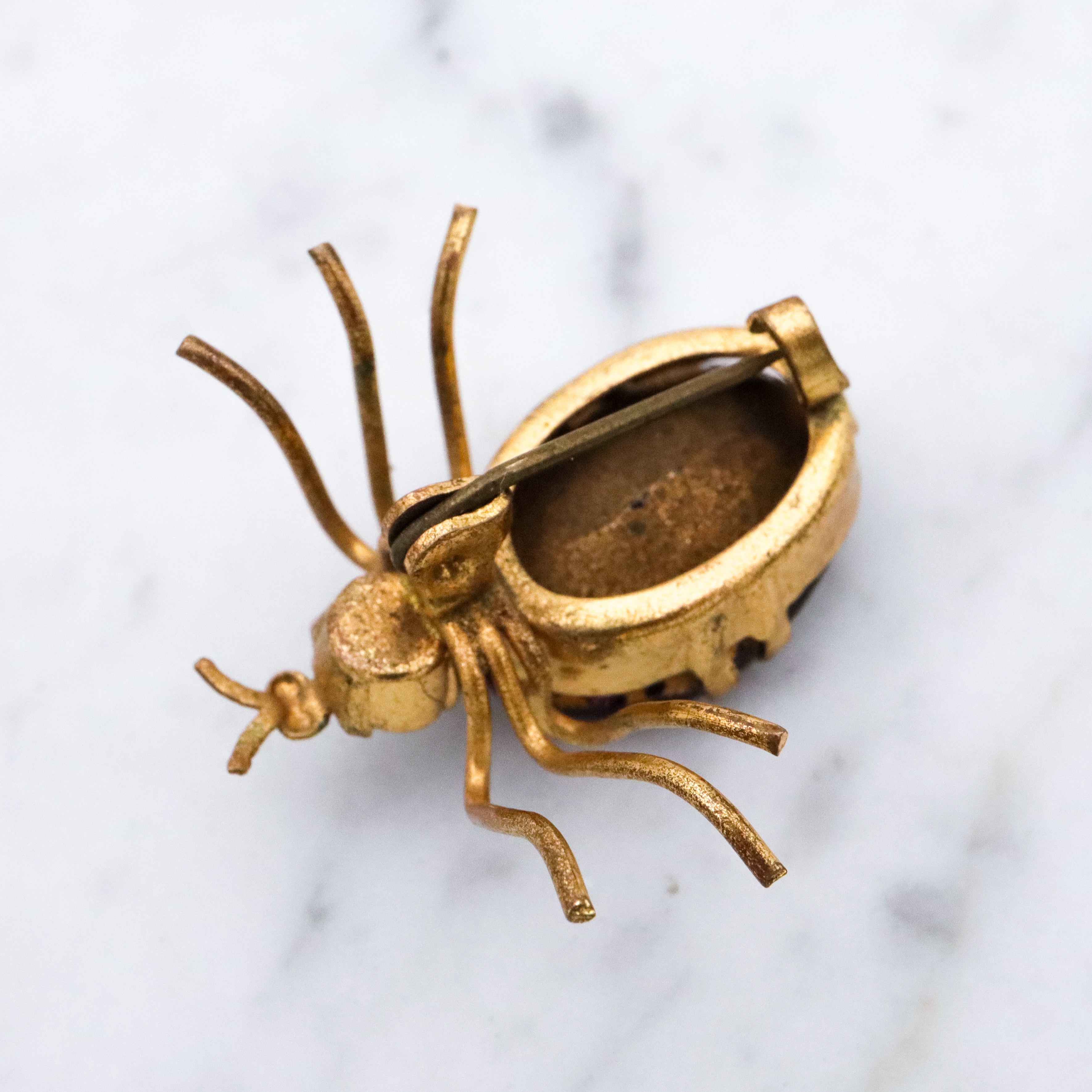 Antique purple rhinestone gilt metal bug brooch