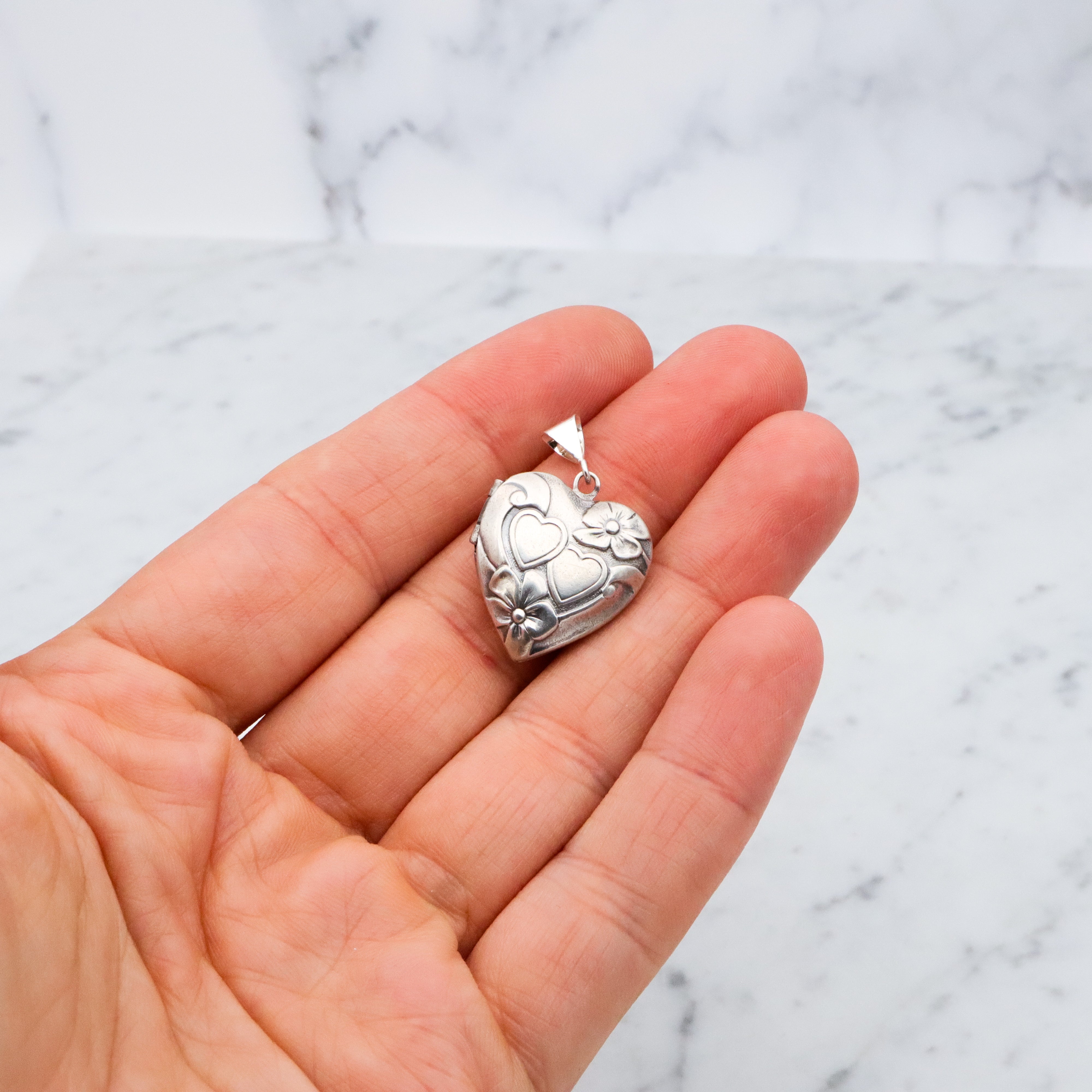 Antique sterling sweetheart locket pendant