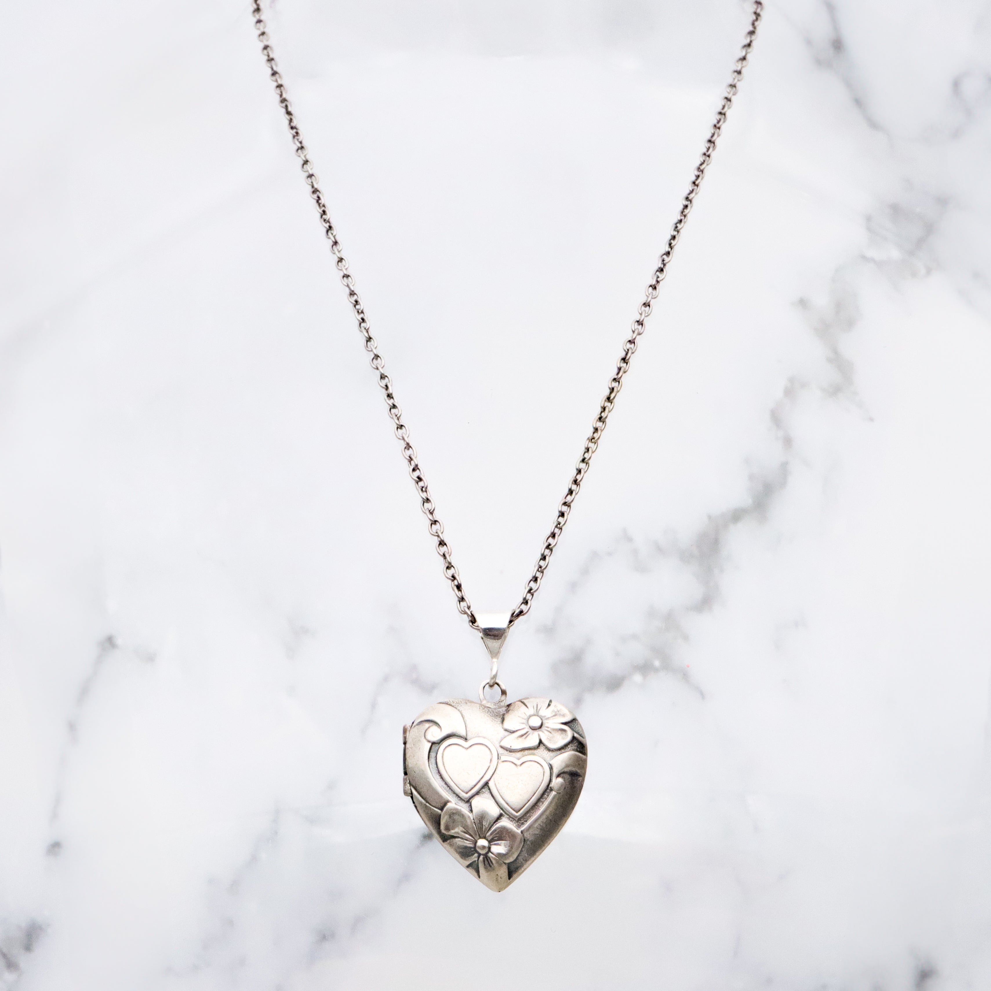 Antique sterling sweetheart locket pendant