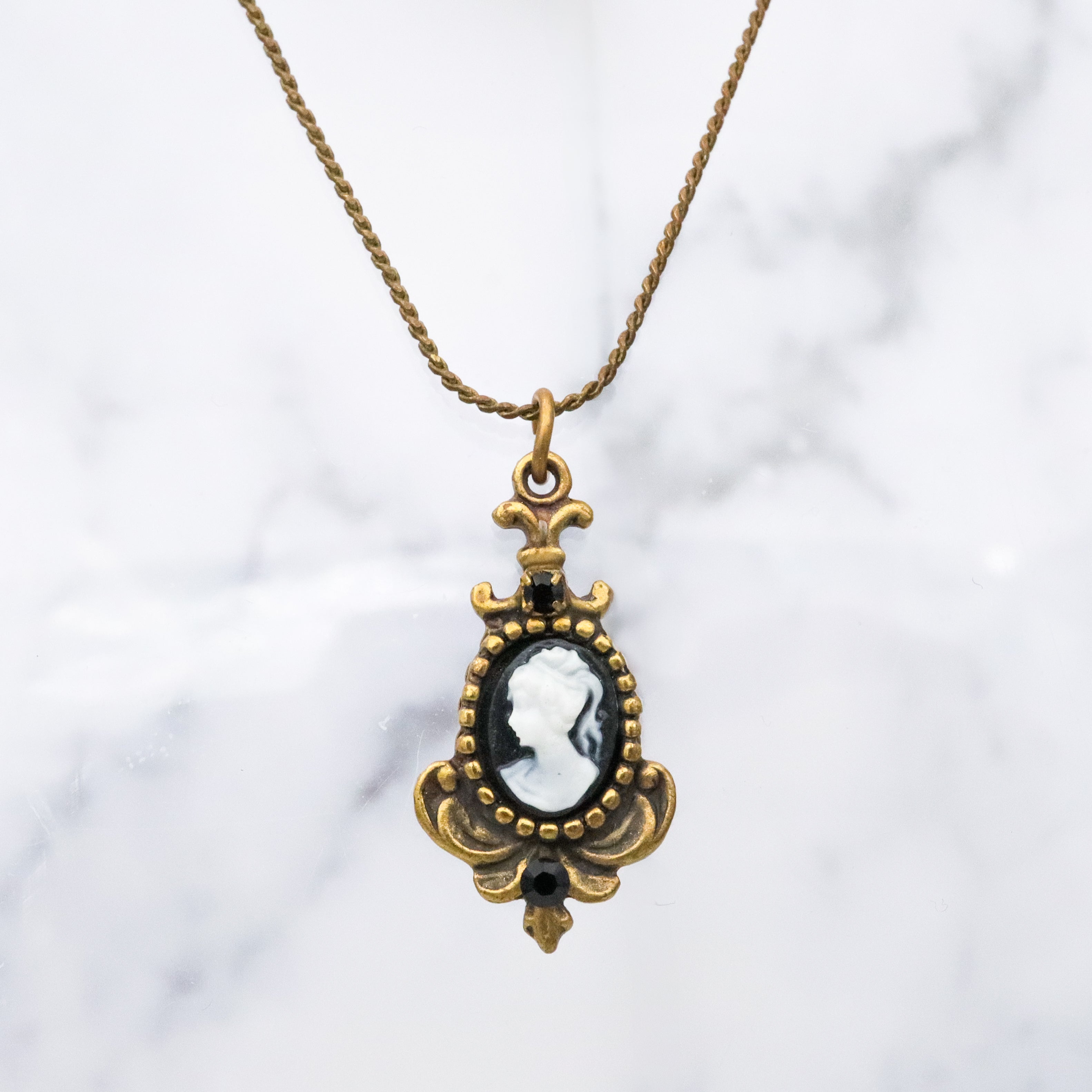 Retro Michal Negrin black & white cameo brass necklace