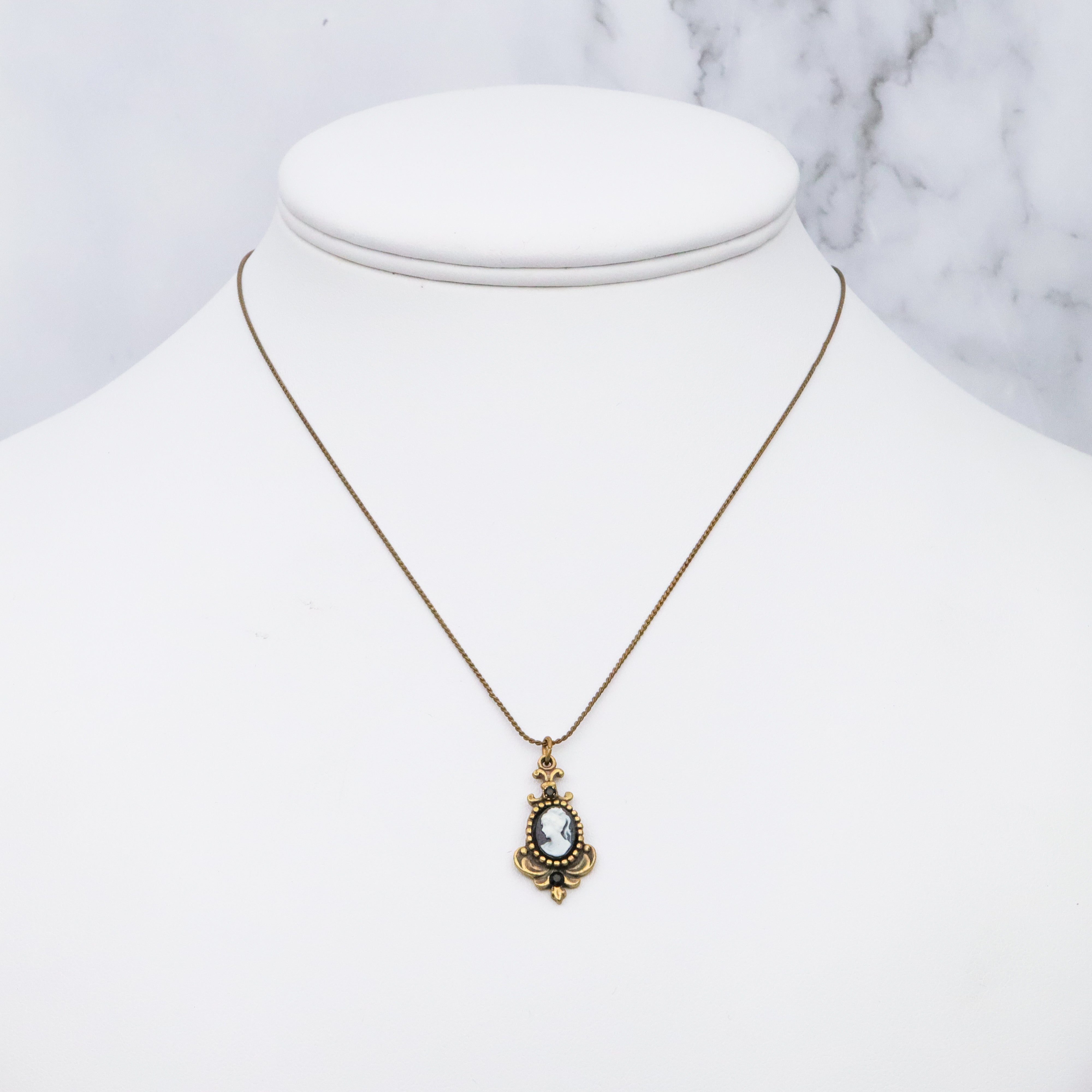 Retro Michal Negrin black & white cameo brass necklace