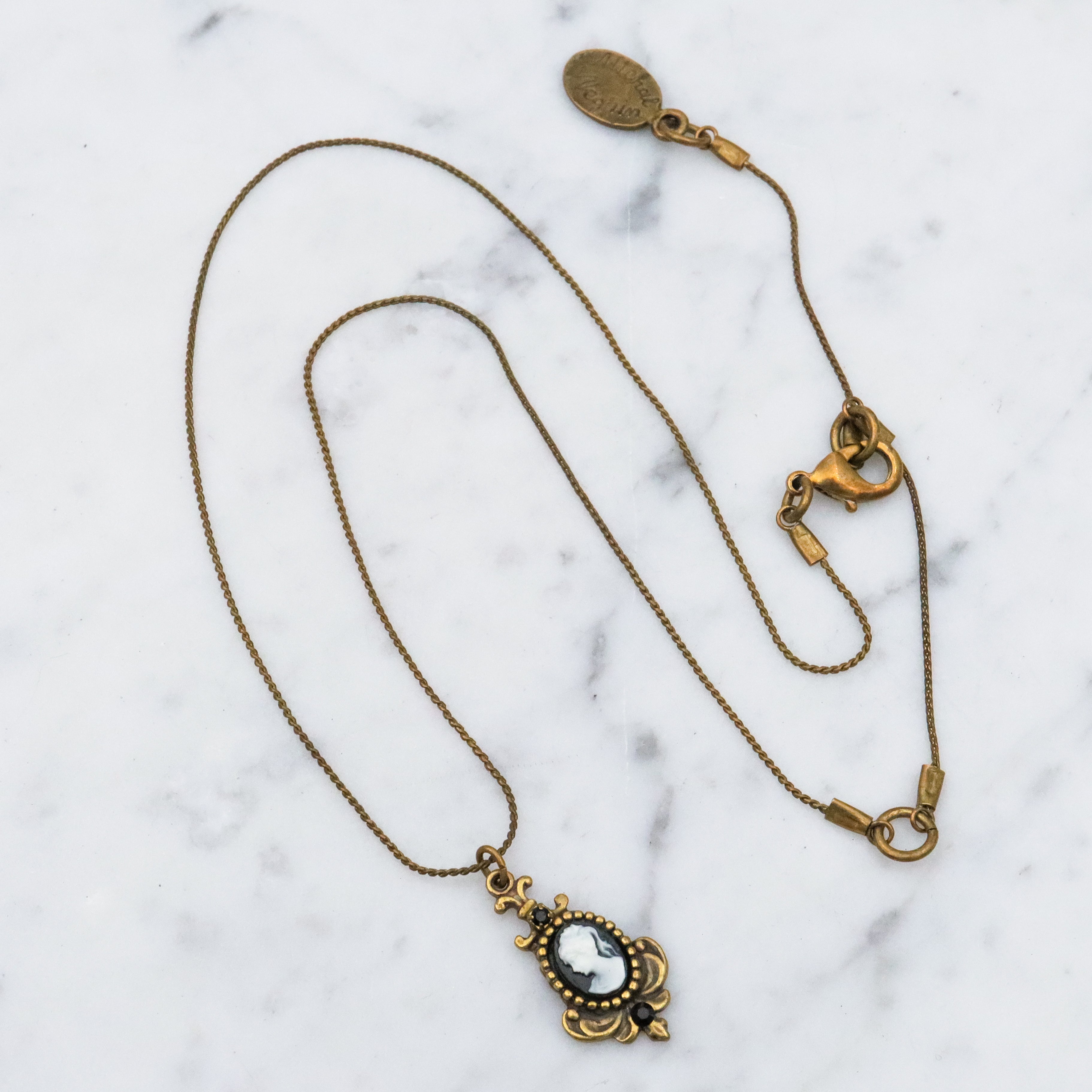 Retro Michal Negrin black & white cameo brass necklace