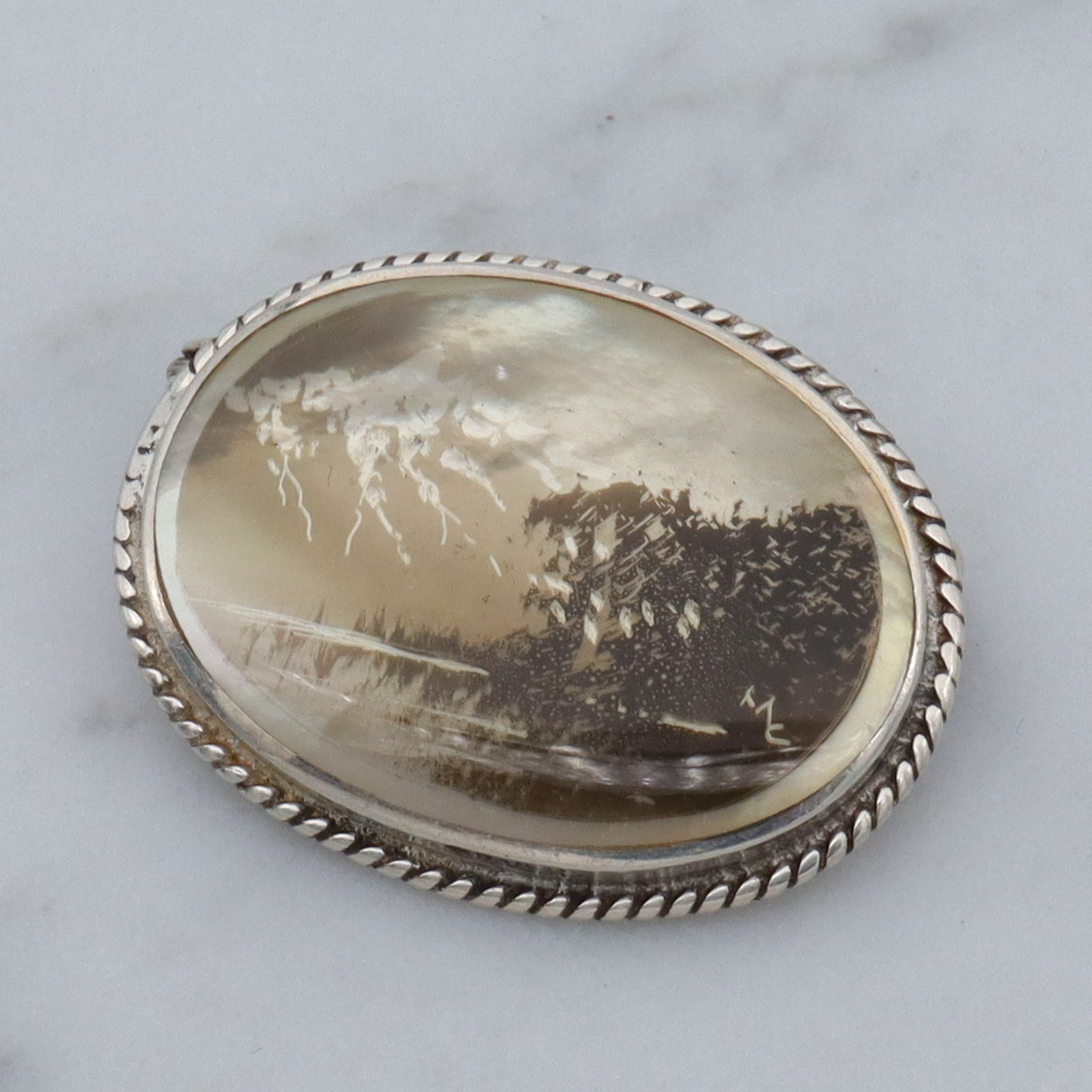 Vintage transfer printed miniature painting on mother of pearl and sterling brooch