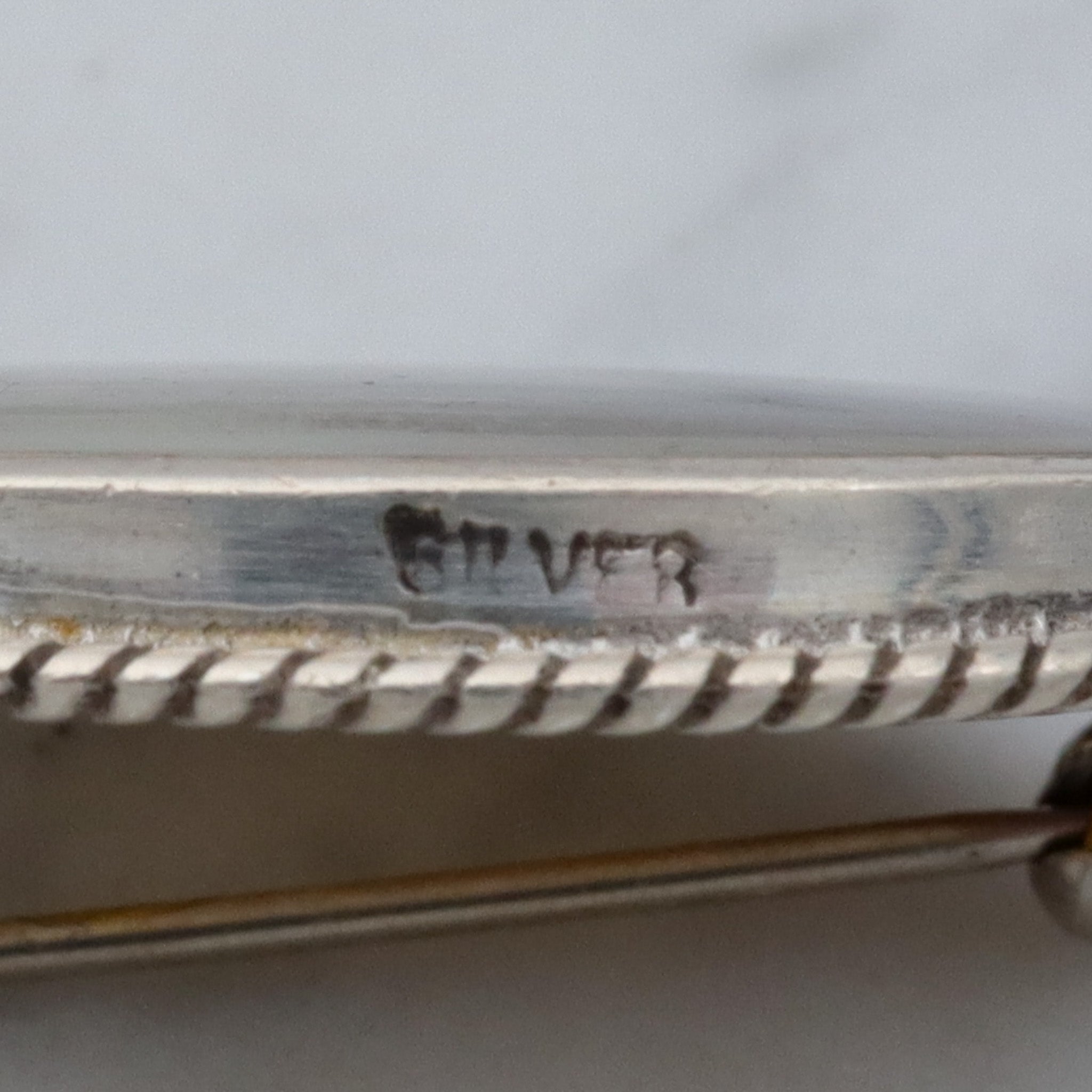 Vintage transfer printed miniature painting on mother of pearl and sterling brooch