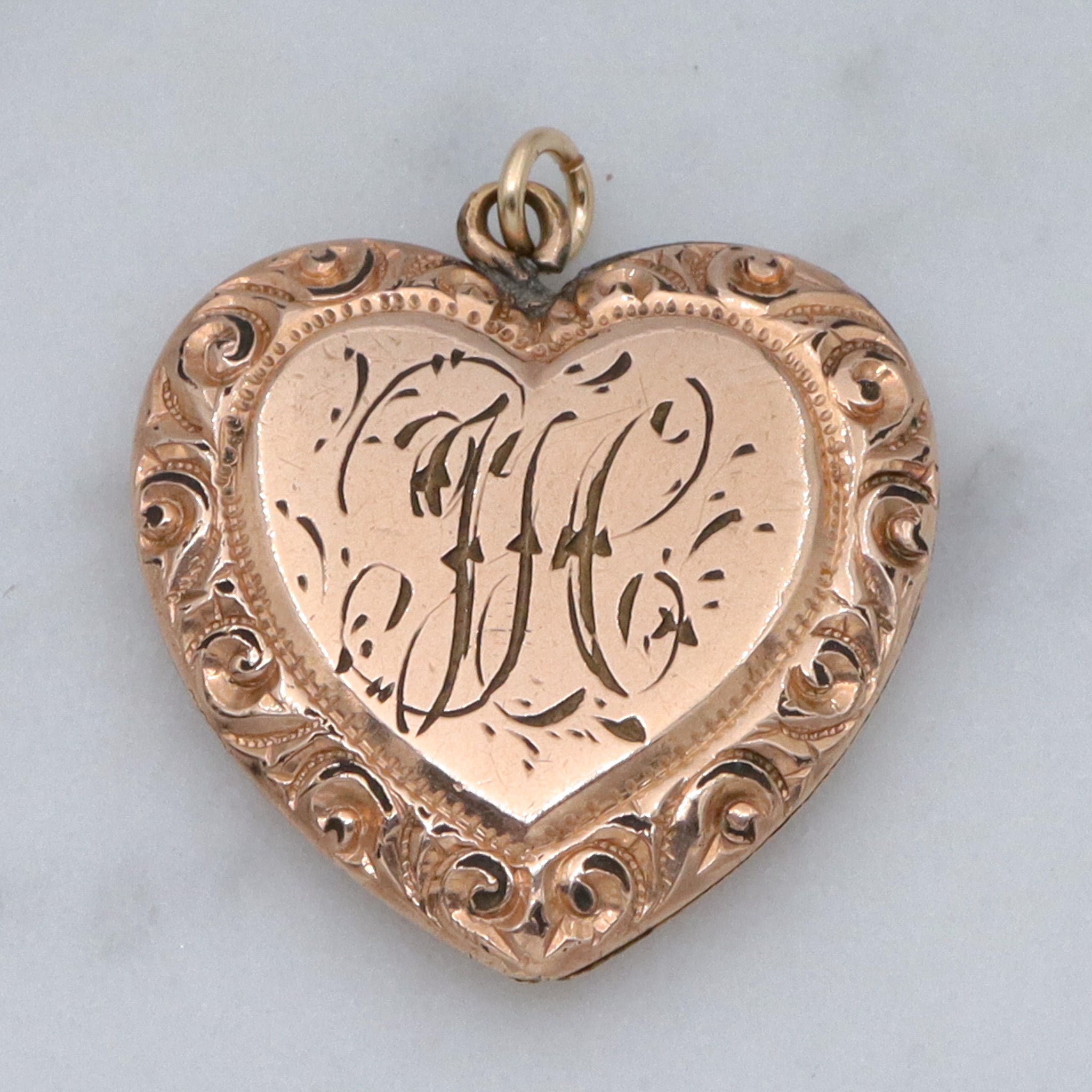 Antique Victorian gold filled repousse heart pendant with “HC” monogram