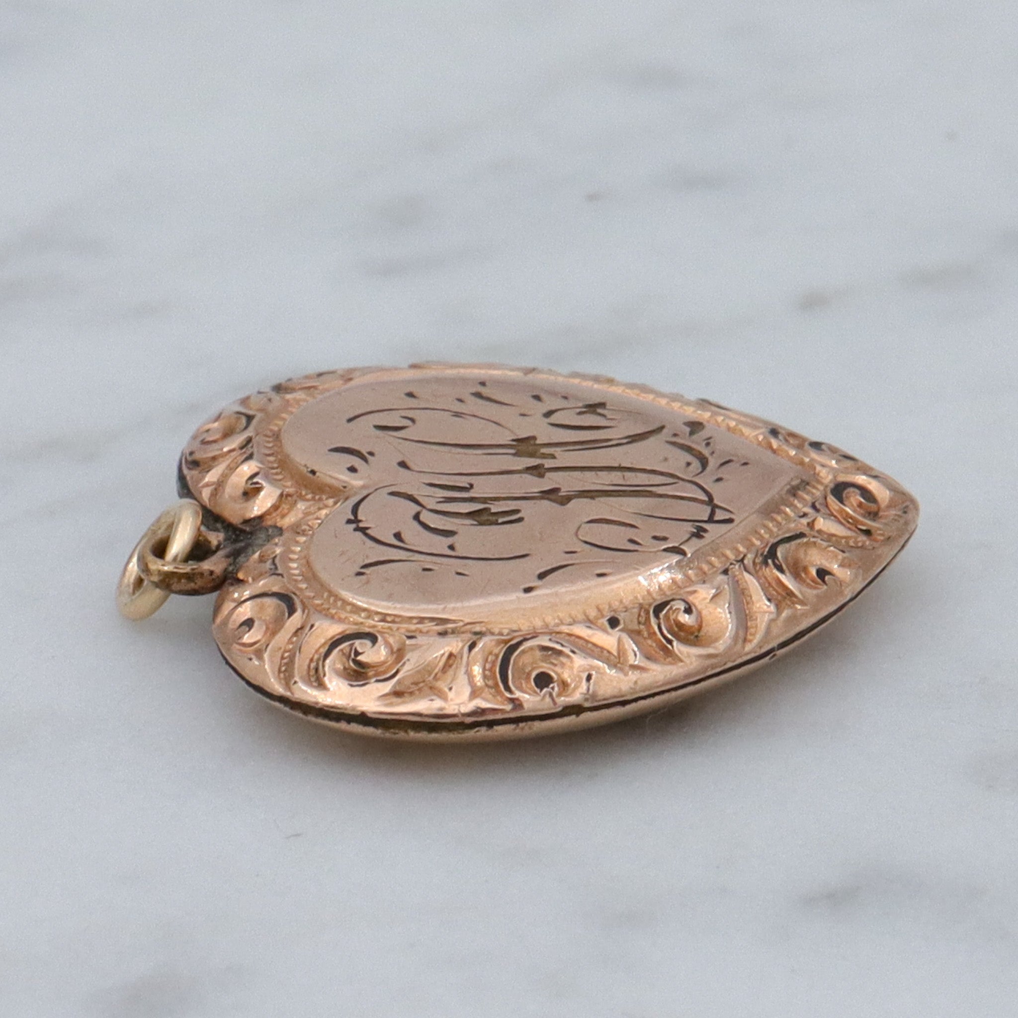 Antique Victorian gold filled repousse heart pendant with “HC” monogram