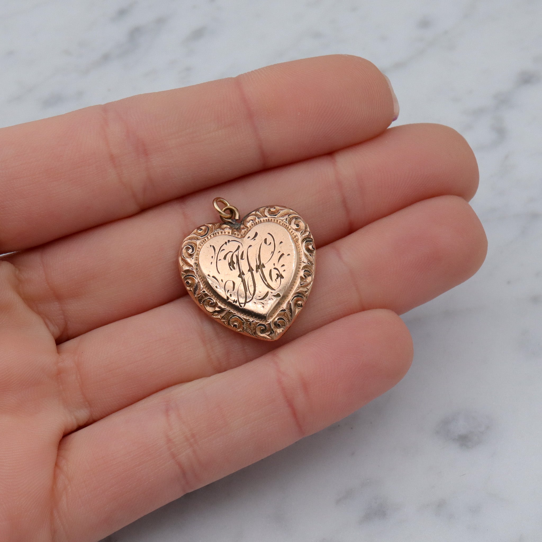 Antique Victorian gold filled repousse heart pendant with “HC” monogram