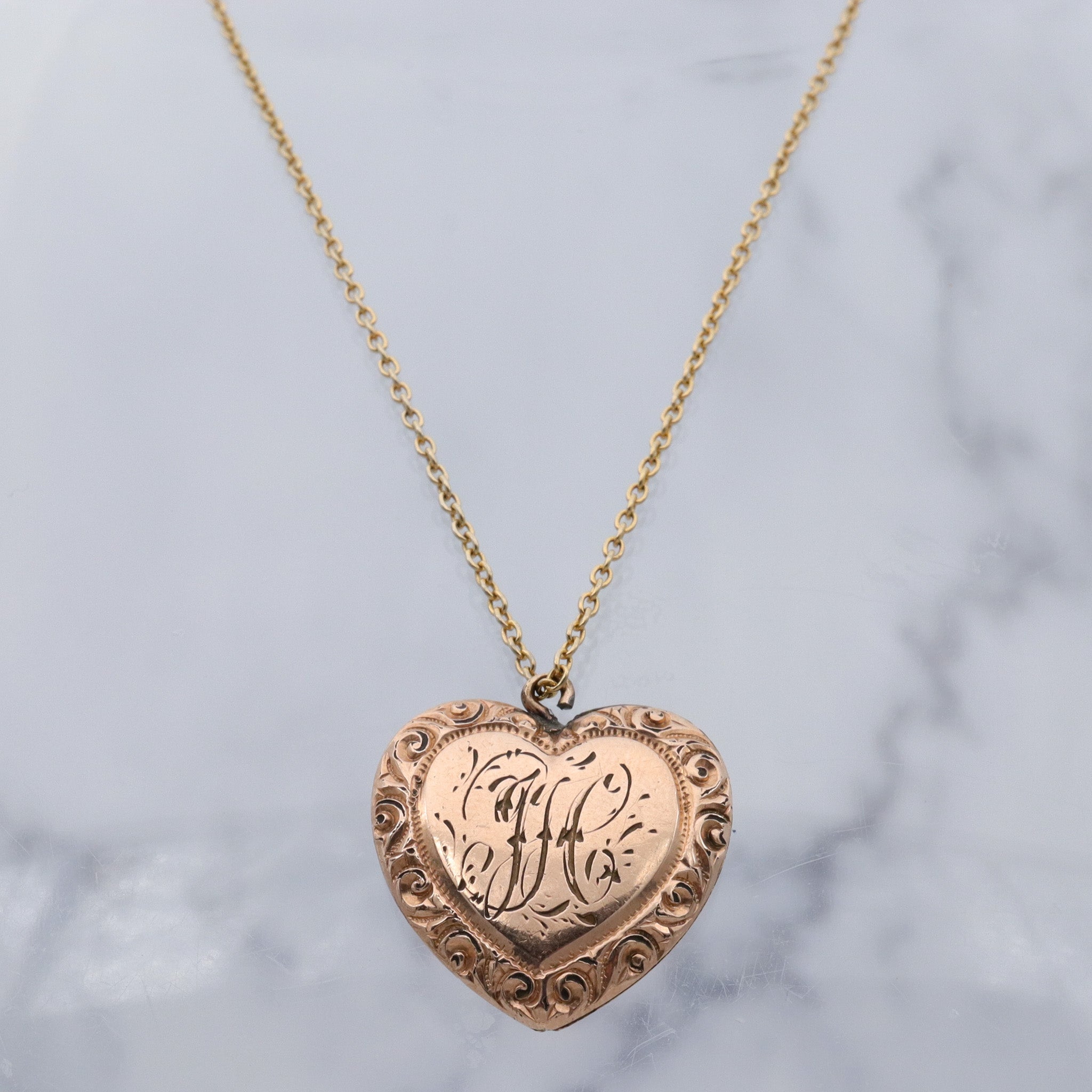 Antique Victorian gold filled repousse heart pendant with “HC” monogram