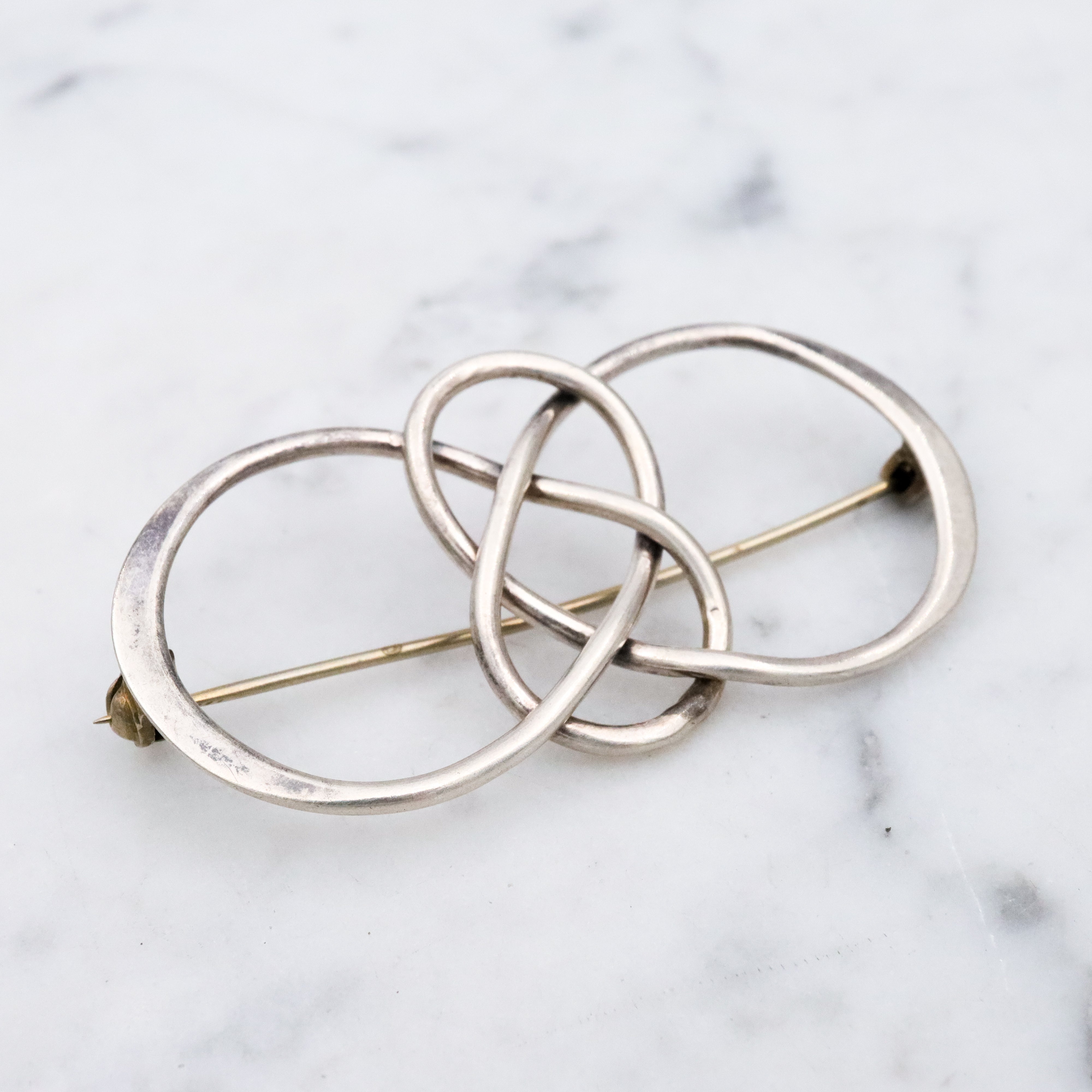 Vintage sterling elongated celtic knot brooch