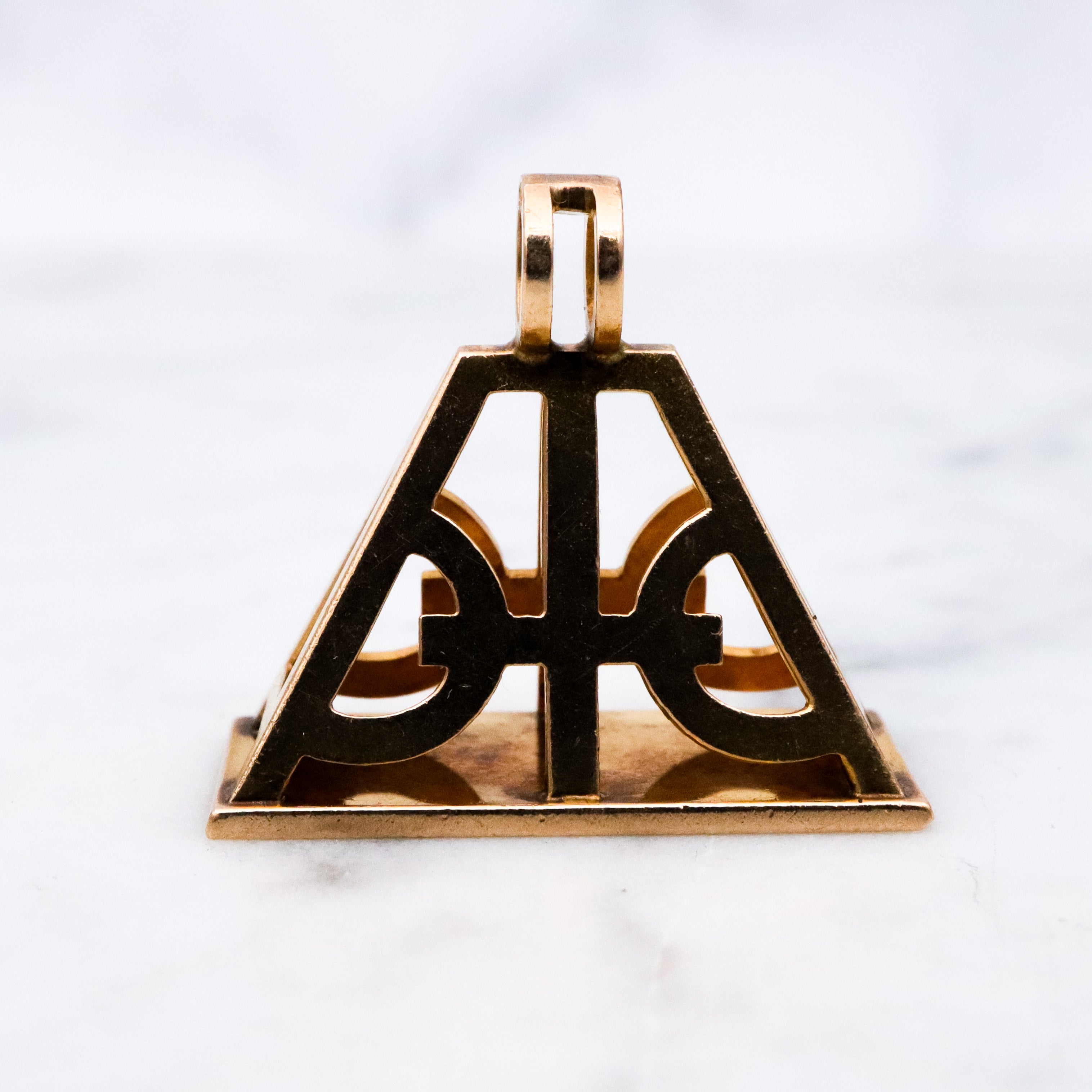 Antique Victorian 10k gold geometric cutout fob pendant