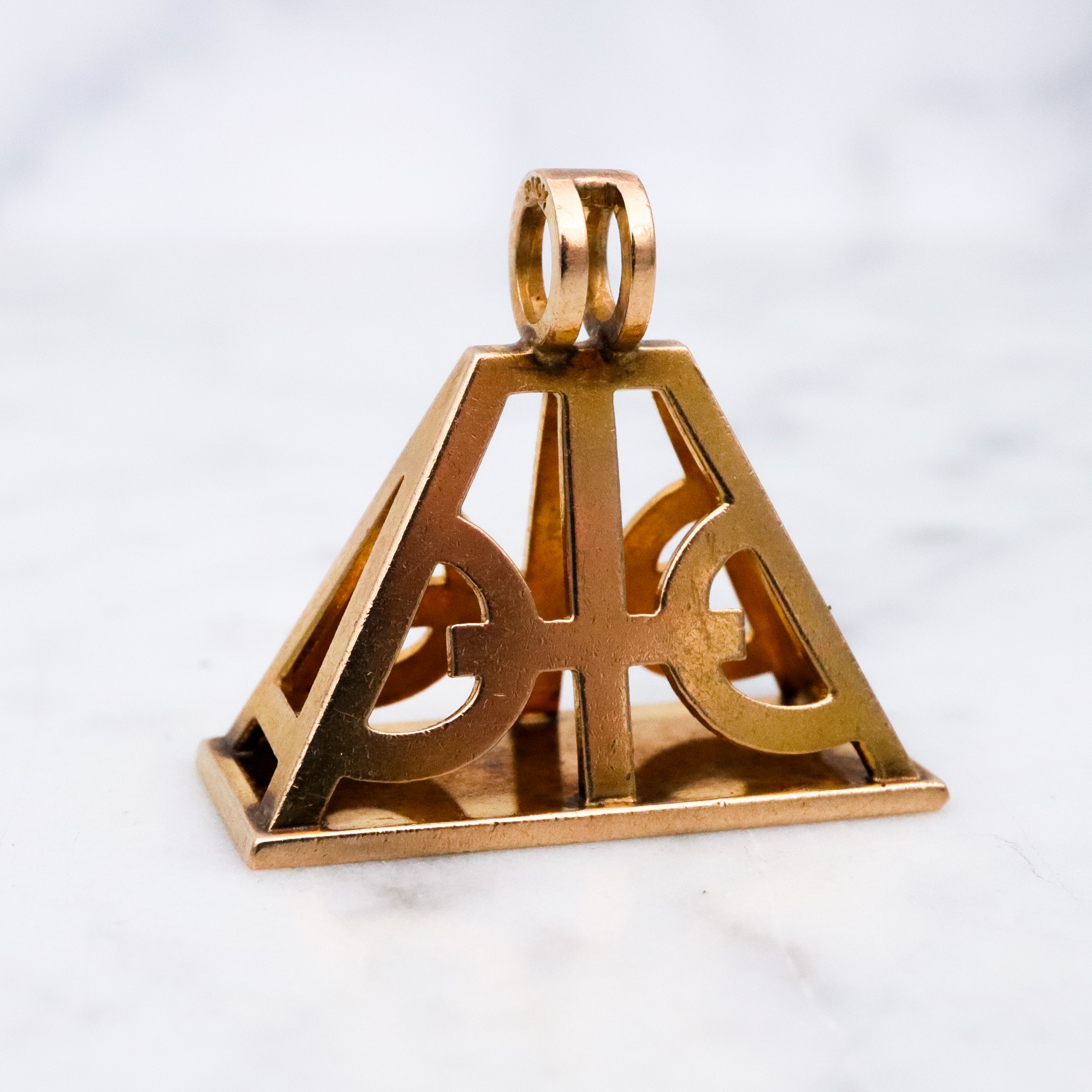 Antique Victorian 10k gold geometric cutout fob pendant