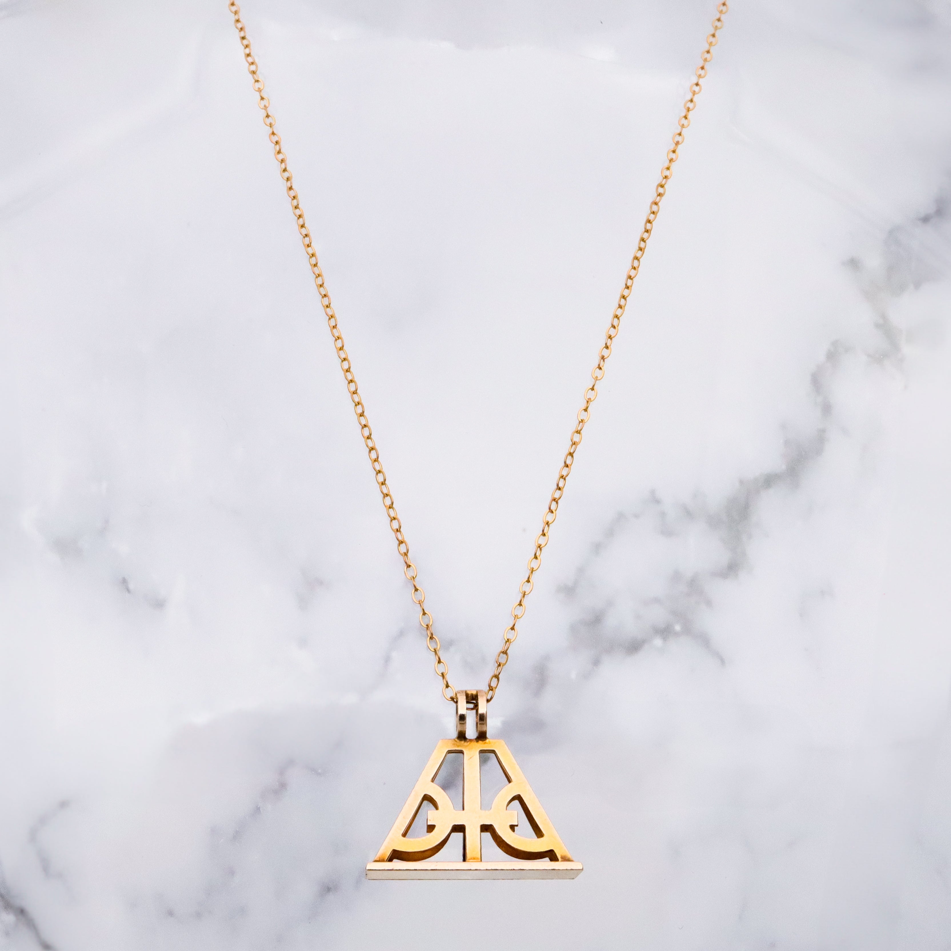 Antique Victorian 10k gold geometric cutout fob pendant