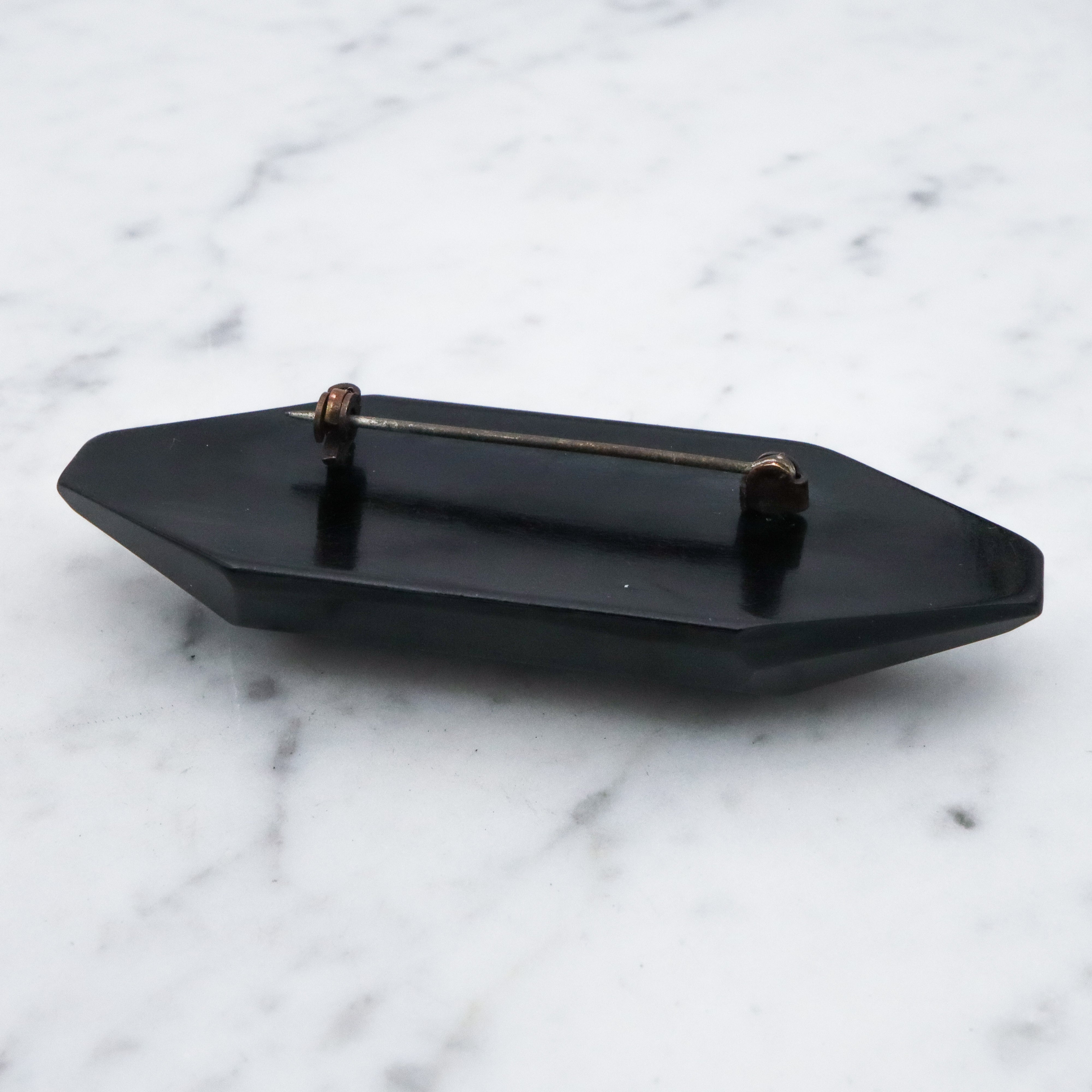 Antique Art Deco black bakelite brooch