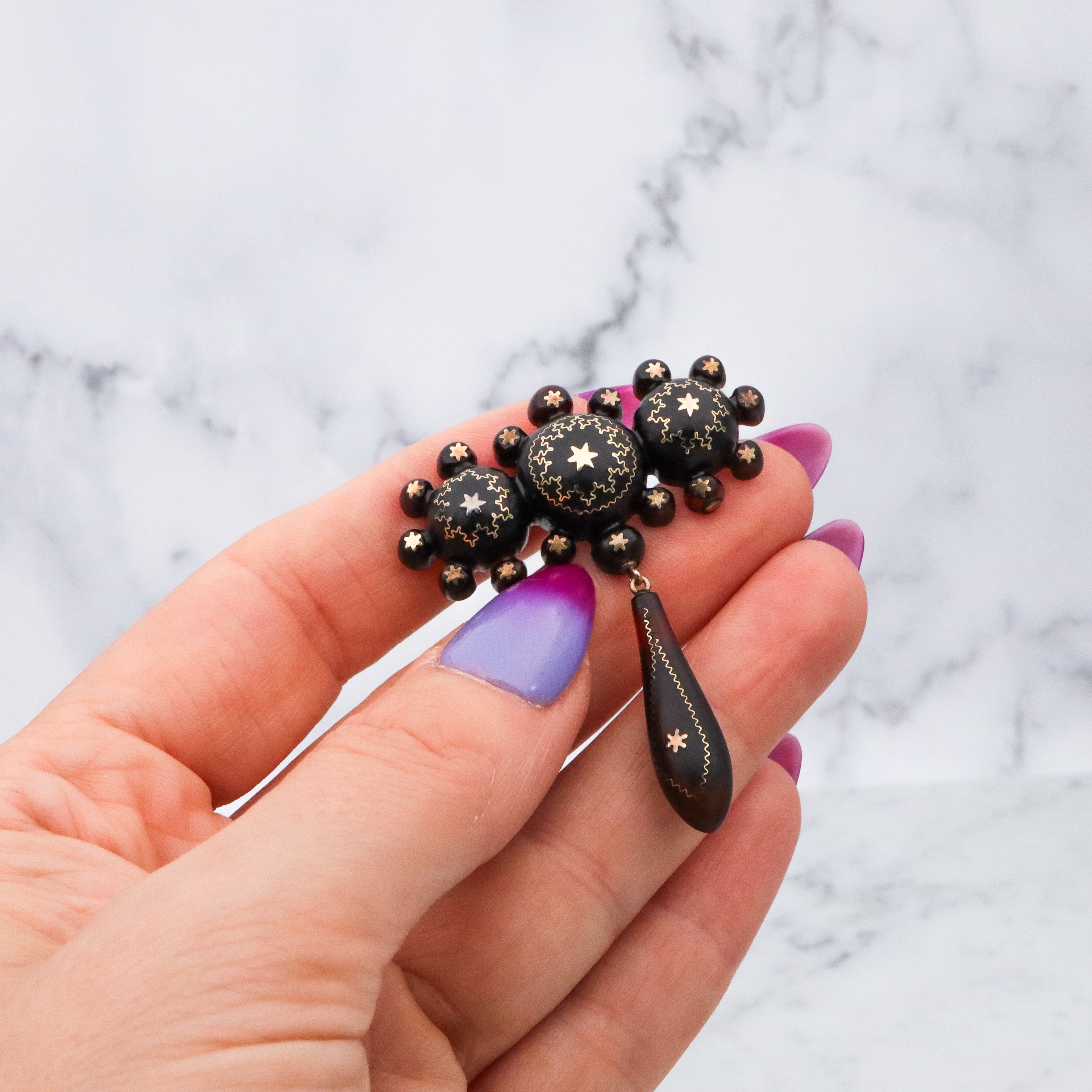 Antique Victorian tortoiseshell gold pique inlay star brooch