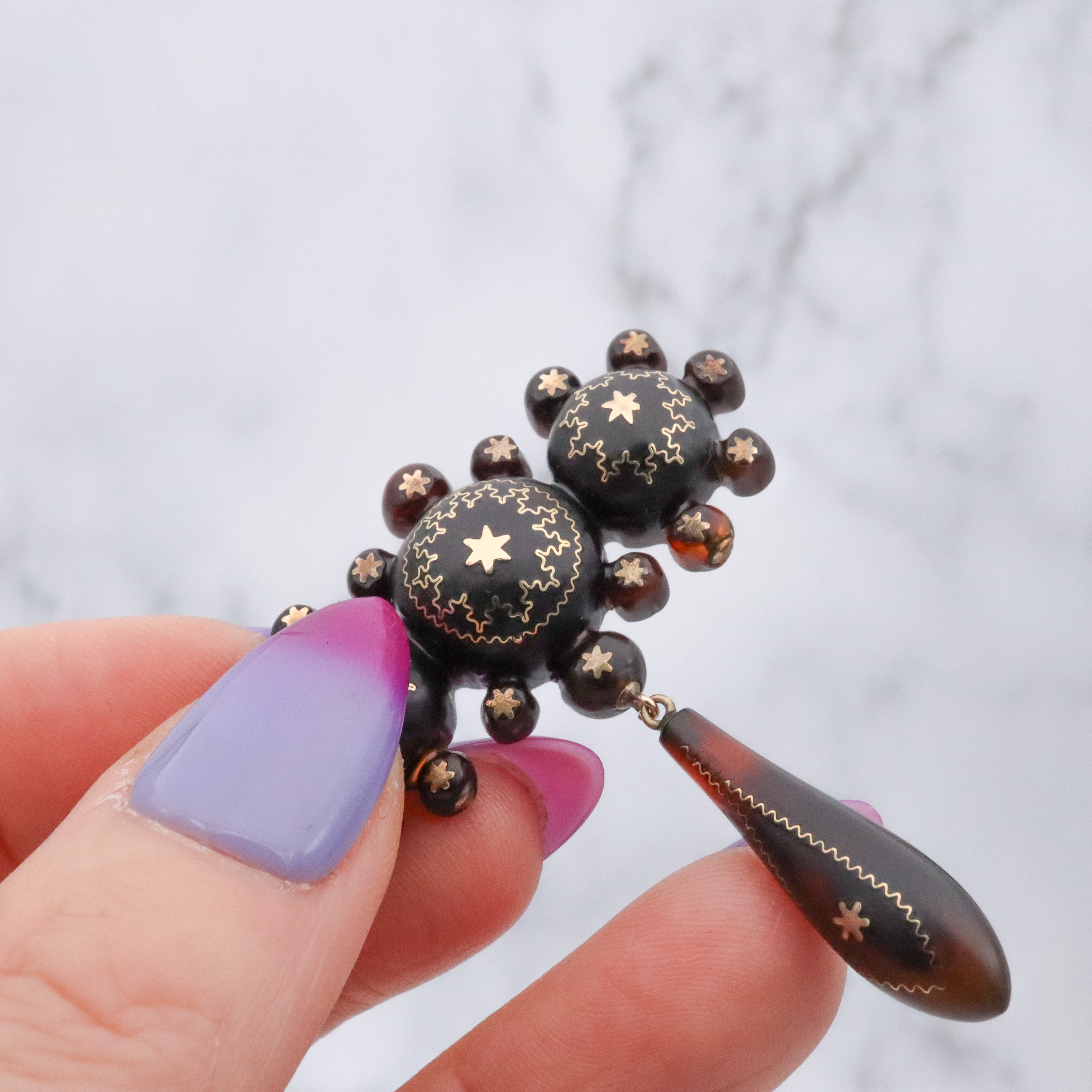Antique Victorian tortoiseshell gold pique inlay star brooch