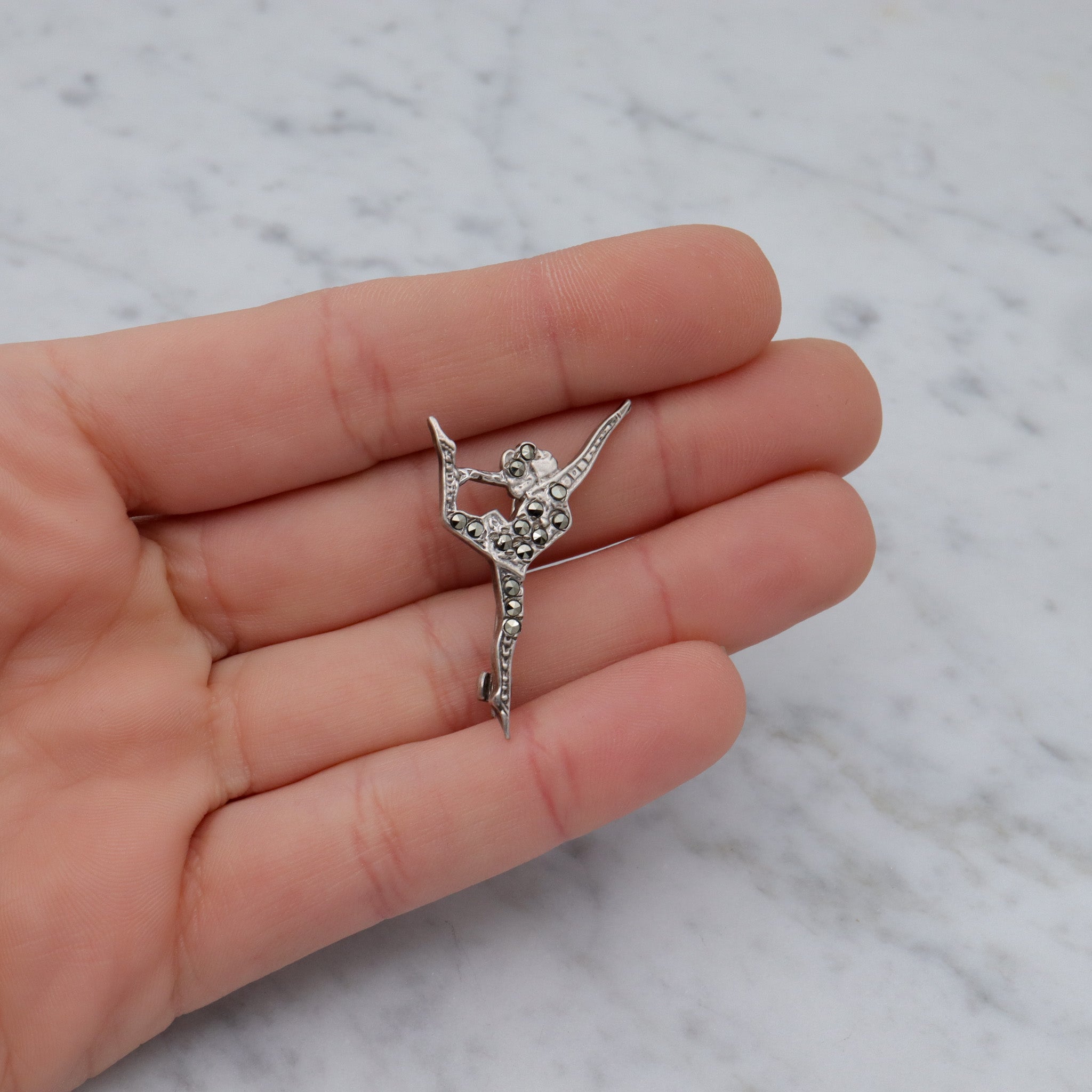 Antique Art Deco sterling marcasite figural gymnast brooch