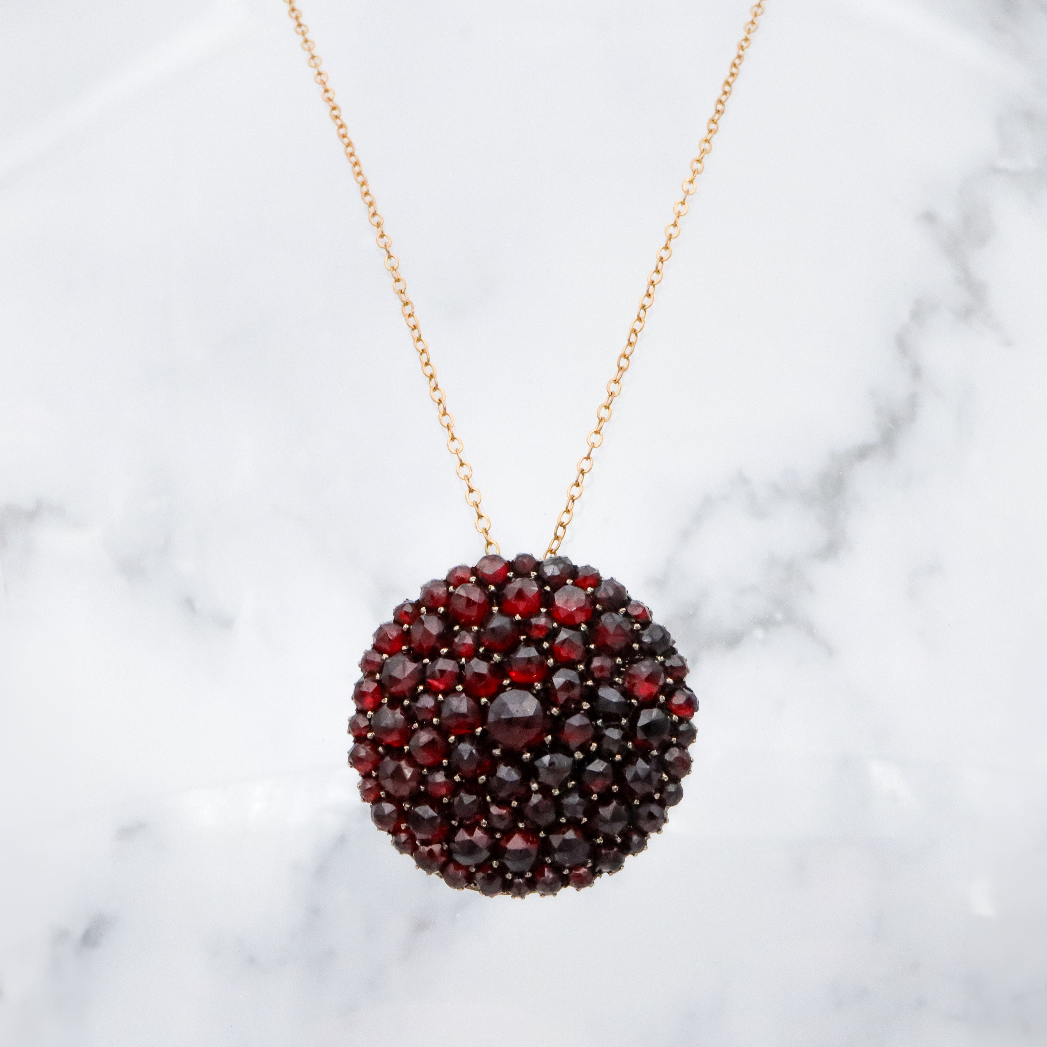 Antique Victorian gilt silver Bohemian garnet domed circle pendant