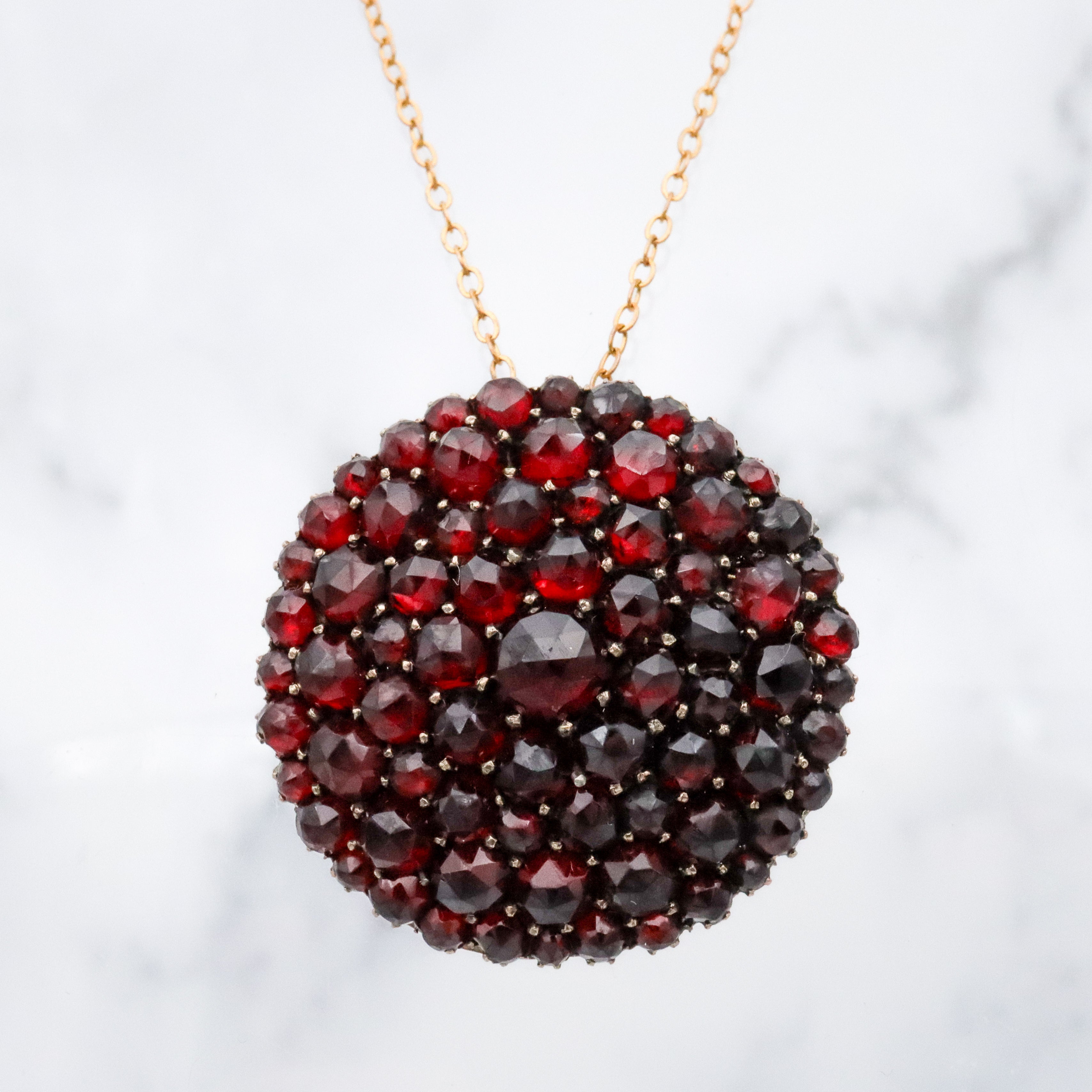 Antique Victorian gilt silver Bohemian garnet domed circle pendant