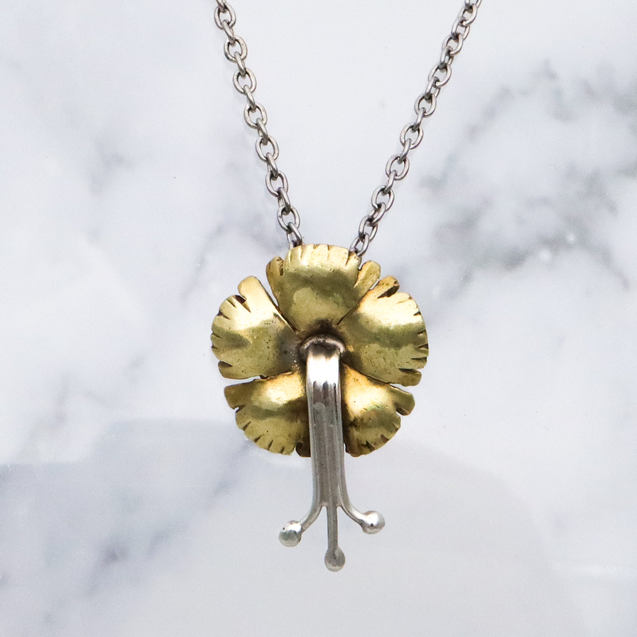 Antique Art Nouveau brass & silver pansy pendant