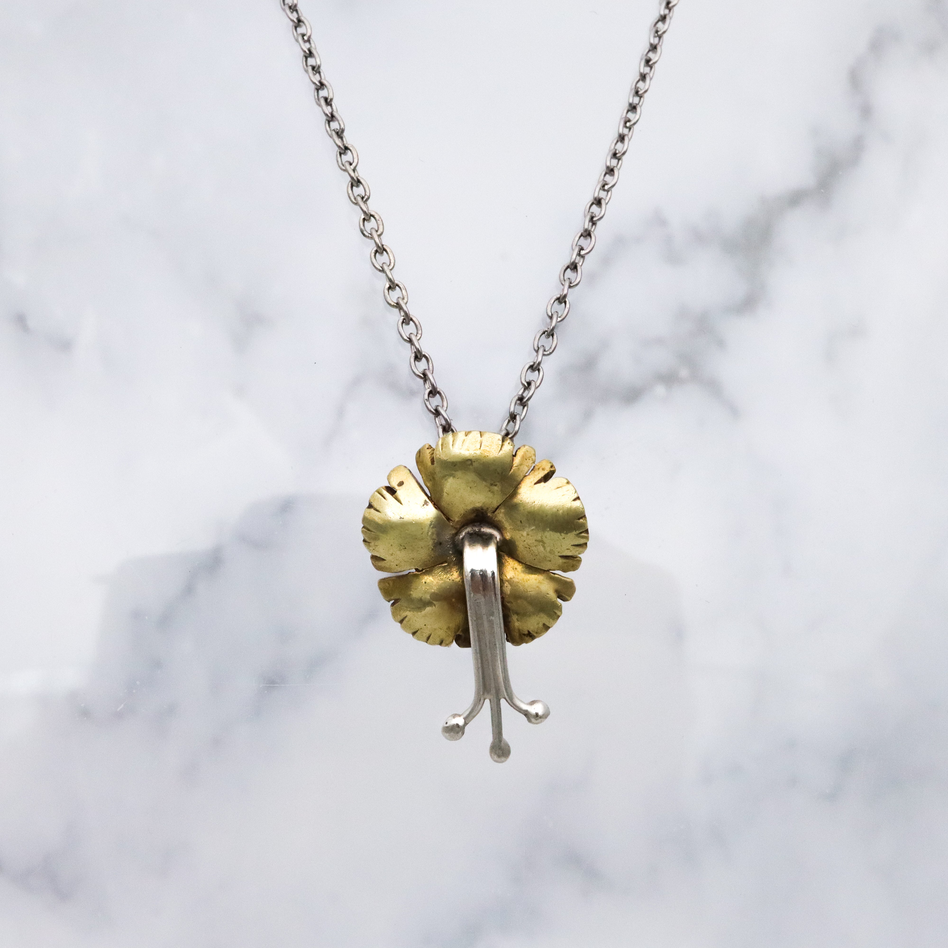 Antique Art Nouveau brass & silver pansy pendant