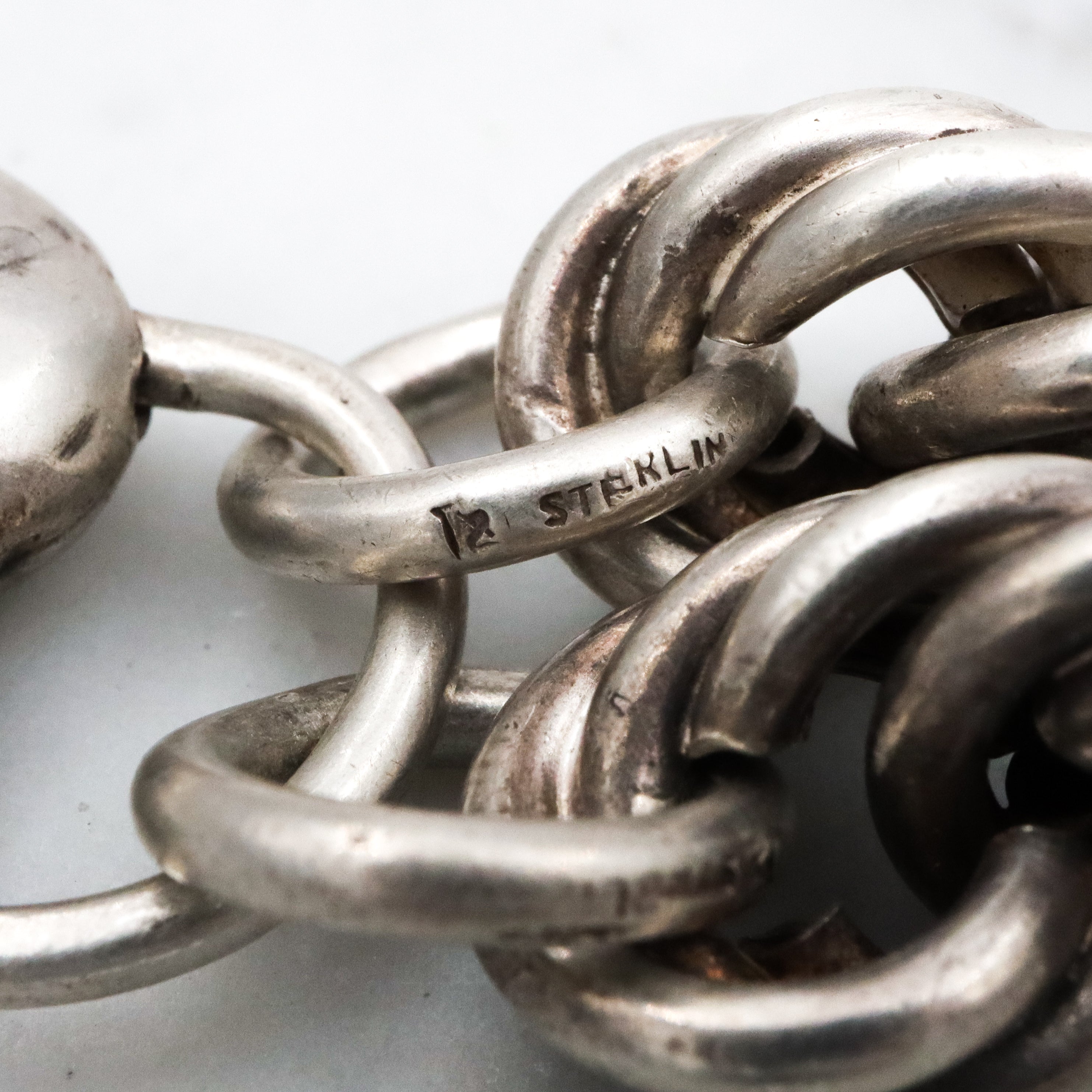 Rare Edwardian sterling Simons Bros thick rope bracelet with heart padlock