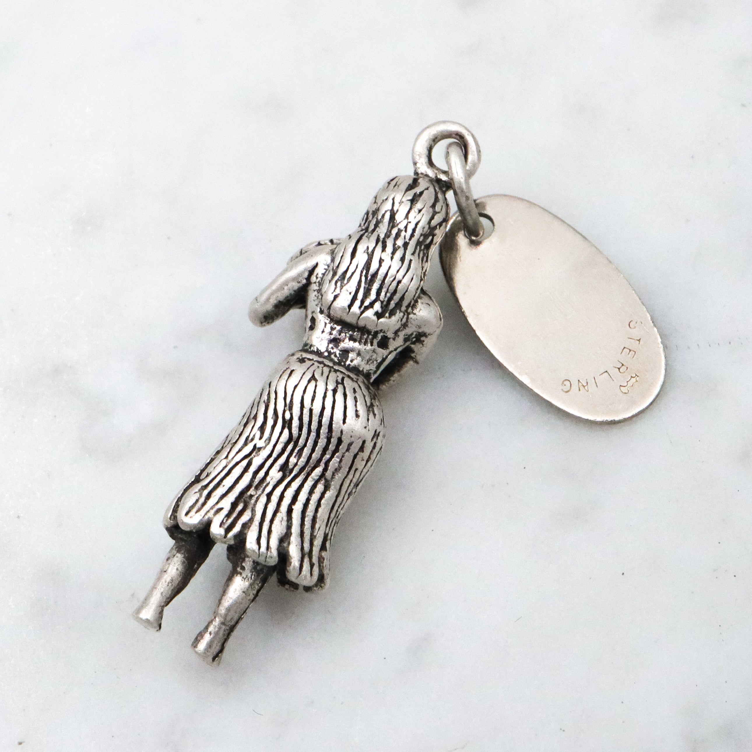 Vintage large sterling Hawaii Hula girl with lei charm pendant