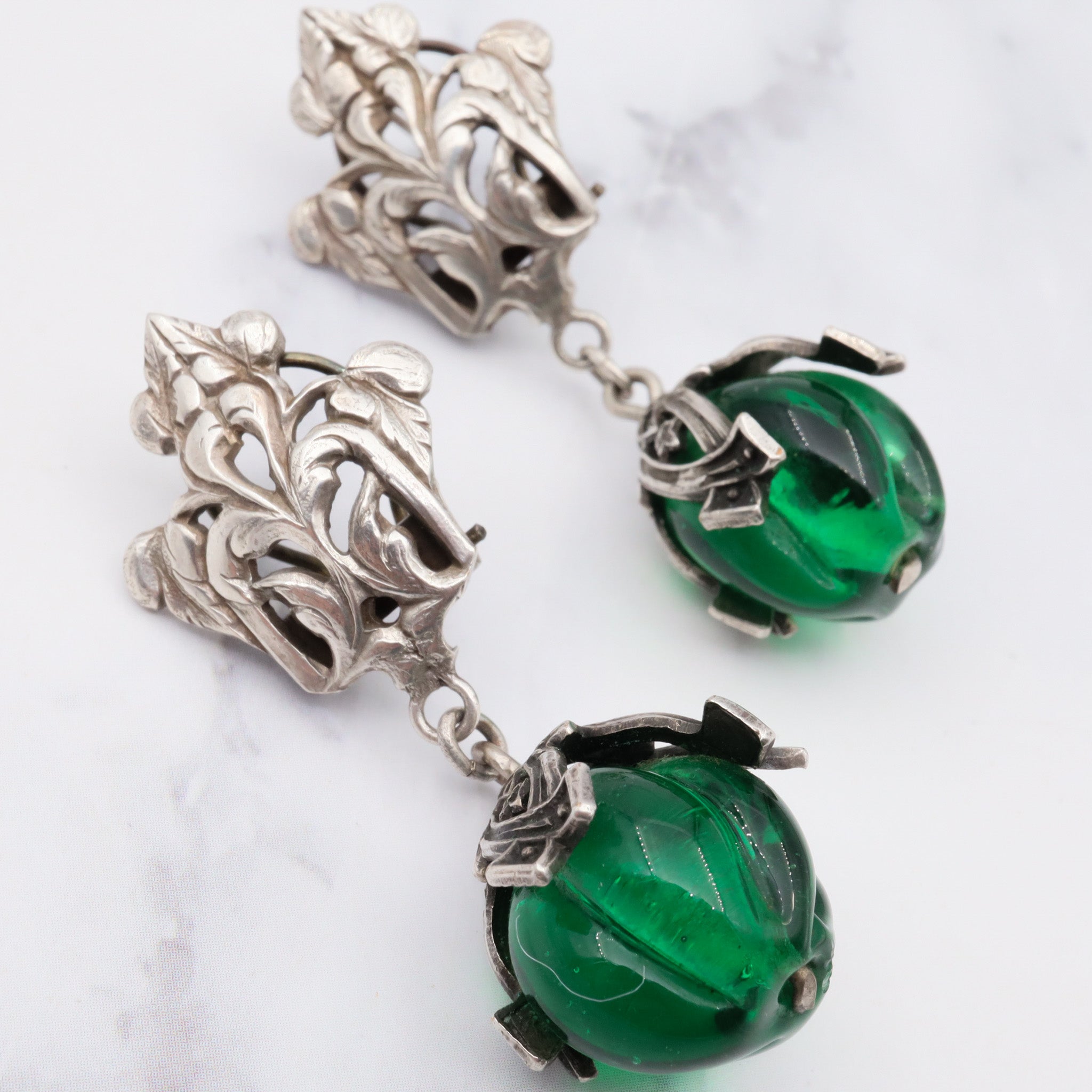 Antique Victorian Renaissance Revival silver plated carved green glass drop bead earrings