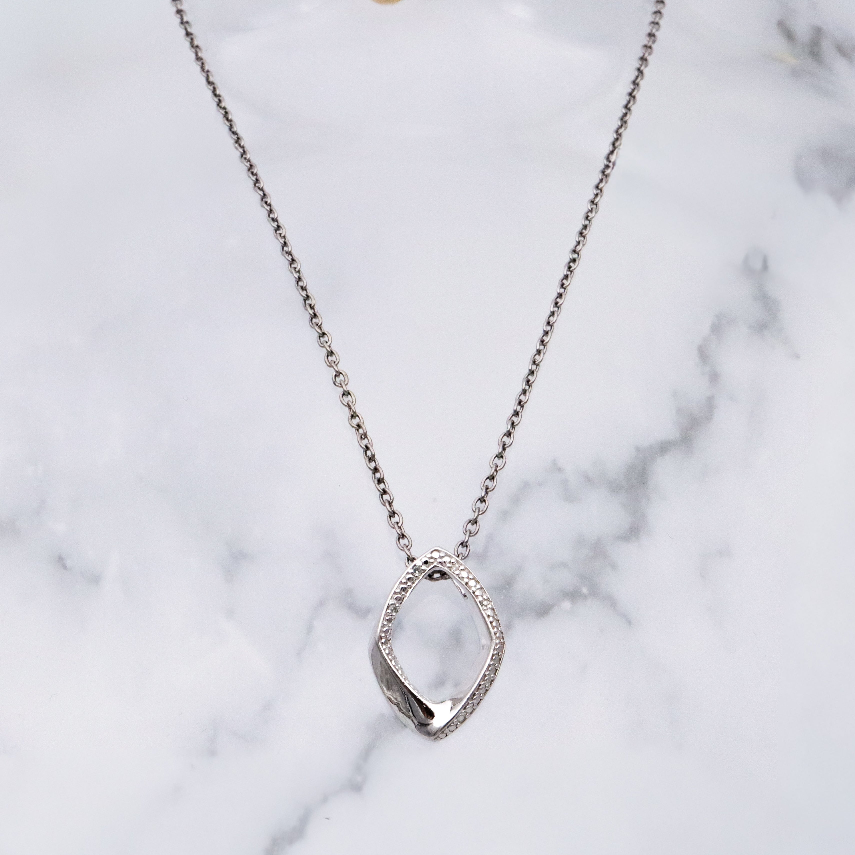 Modern Vintage sterling elongated navette pendant with diamond accents