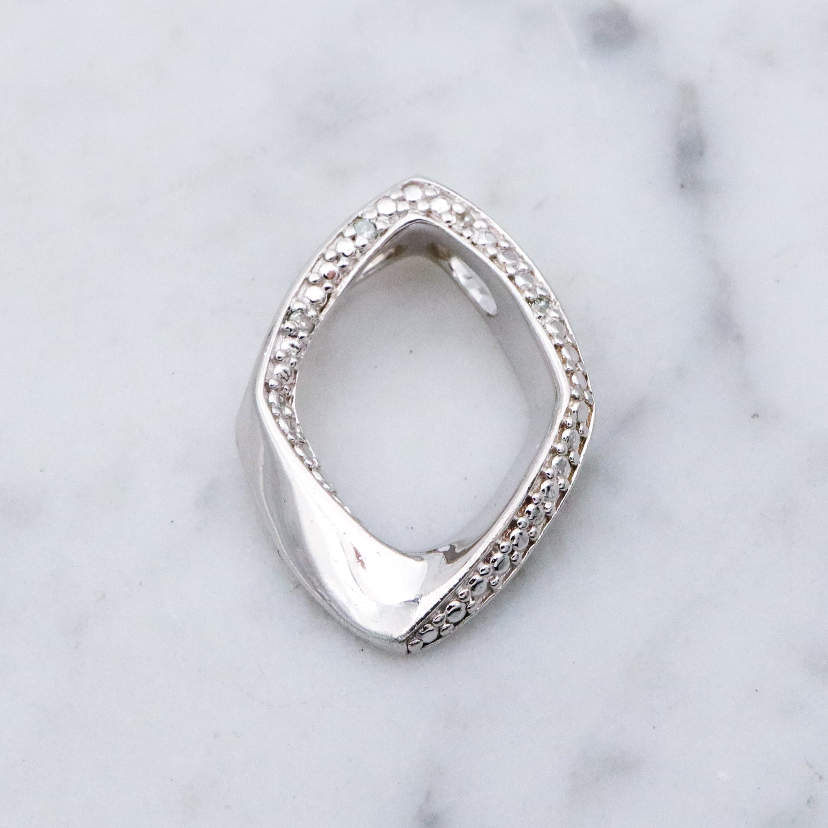 Modern Vintage sterling elongated navette pendant with diamond accents