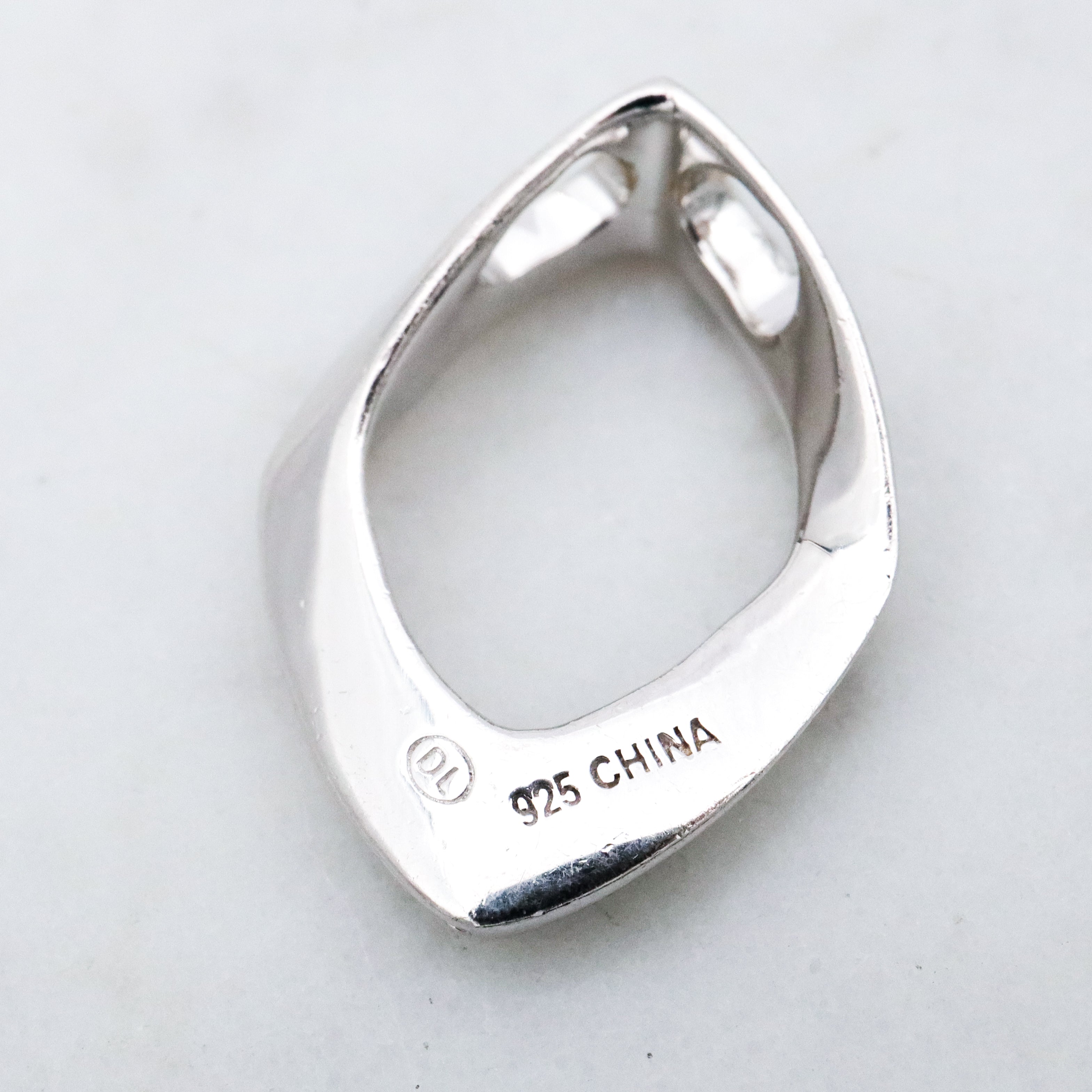 Modern Vintage sterling elongated navette pendant with diamond accents